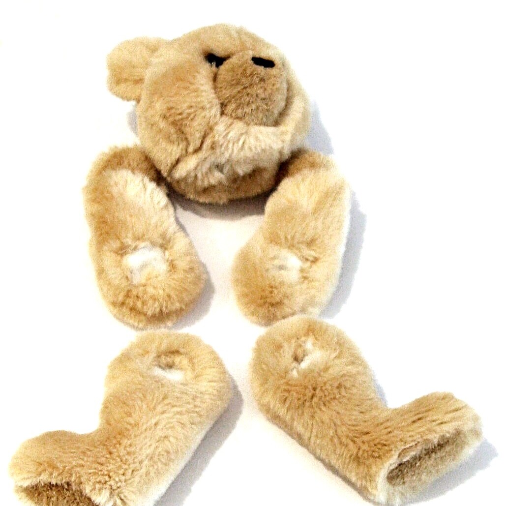 Stuffing the parts of a handmade teddy bear