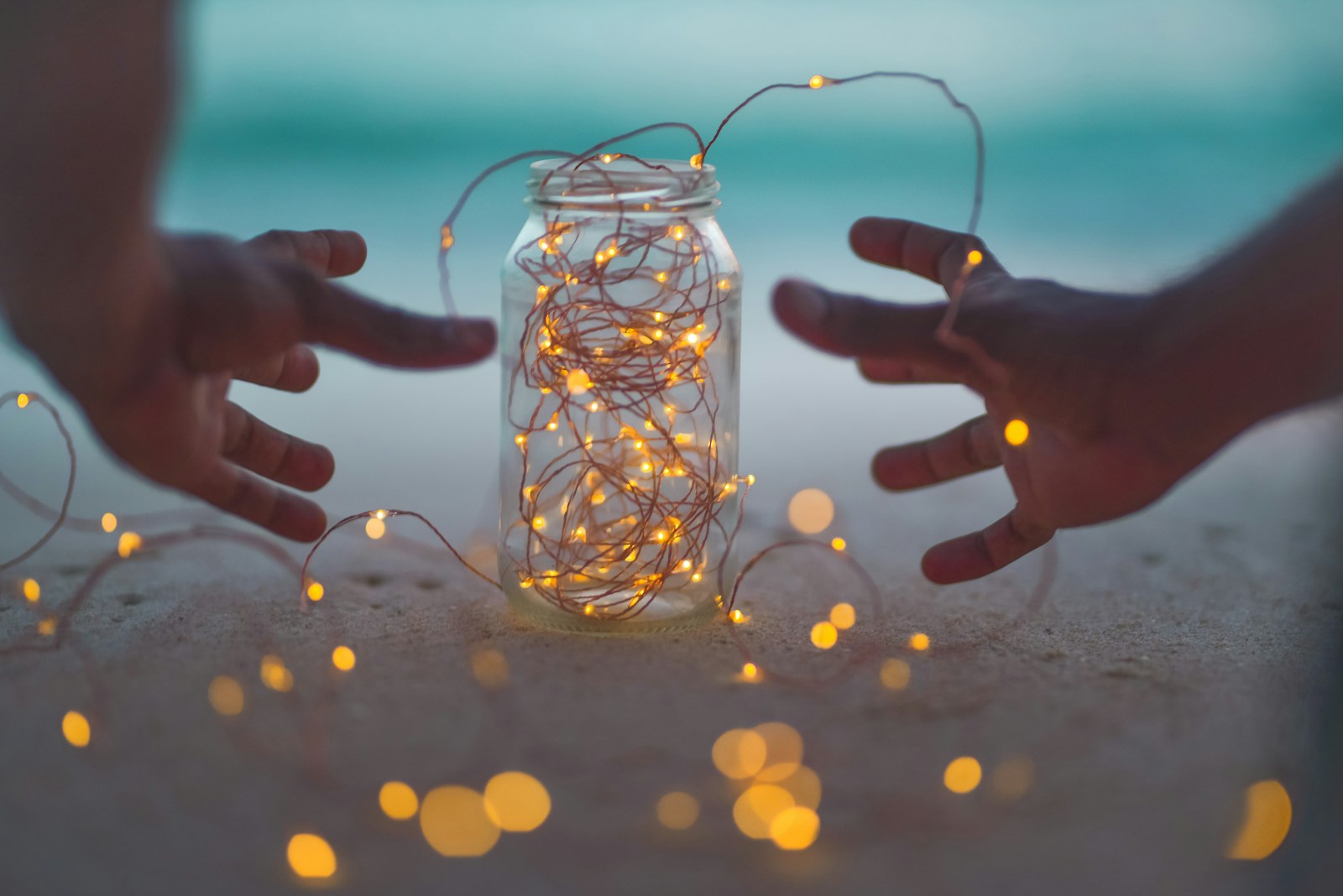 Mason jar glowing with battery string lights
