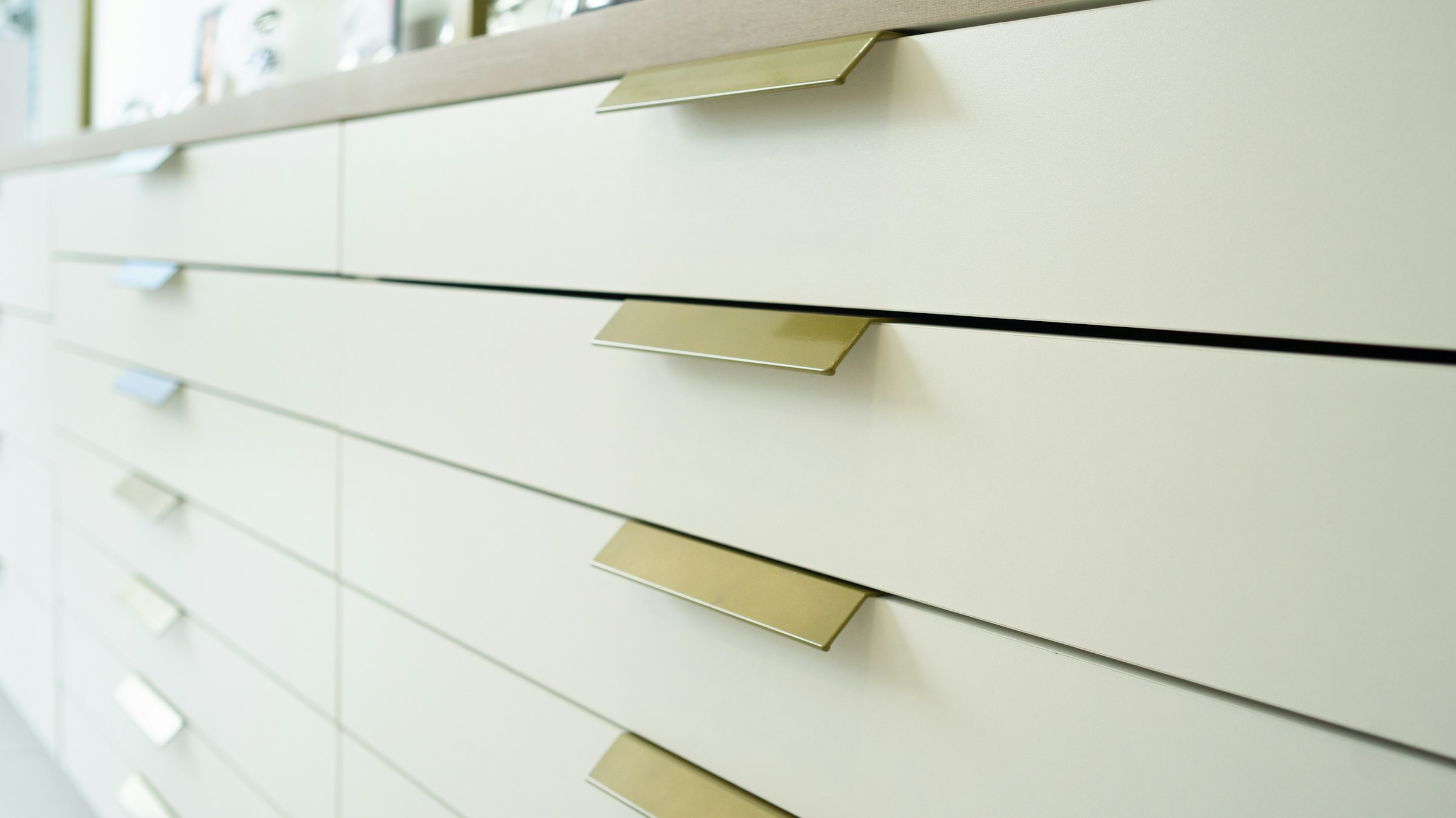 White dresser with new brass handles