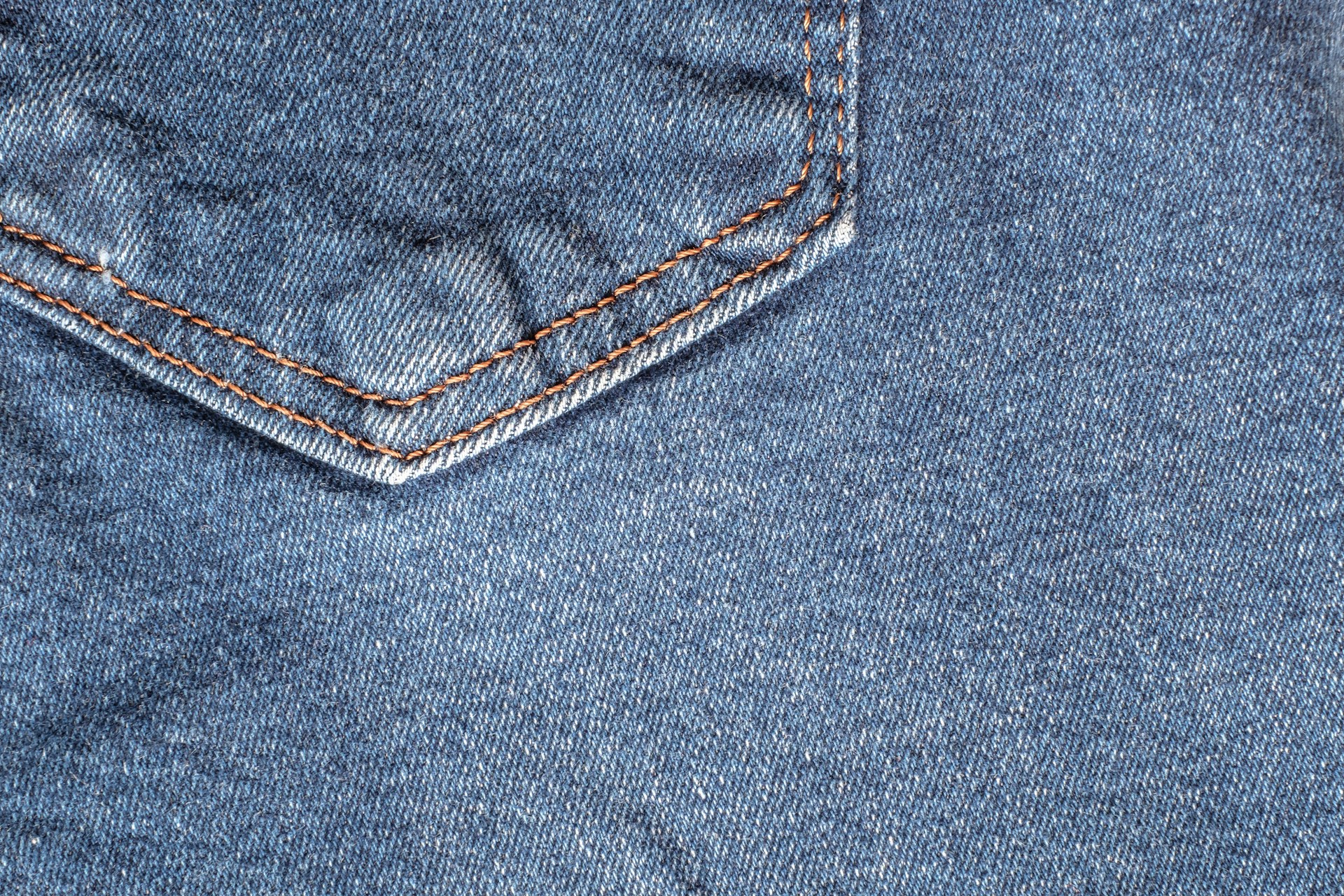Back pocket of old blue jeans ready to become a denim stocking