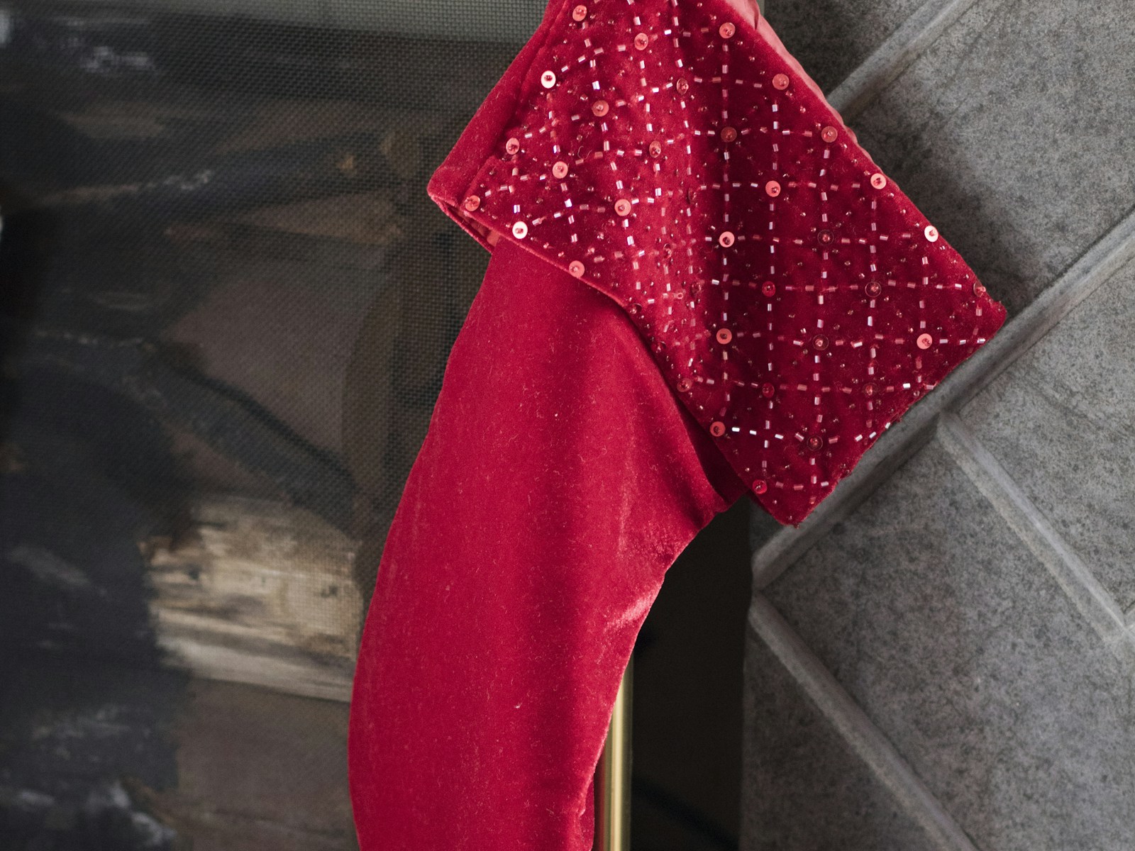 Red velvet Christmas stocking with a sparkly sequin cuff
