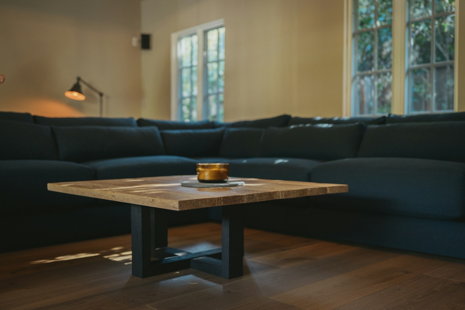 Before guests arrive styled wooden coffee table in a bright living room