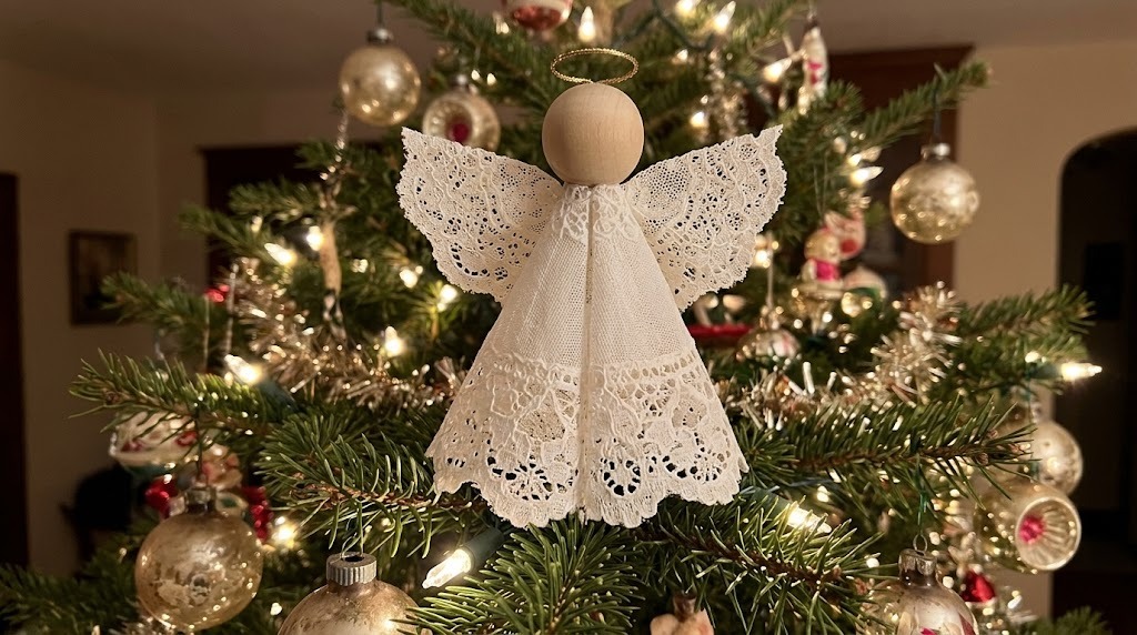 Christmas tree topper ideas from Grandma: a lace doily angel with a wooden bead head and gold halo