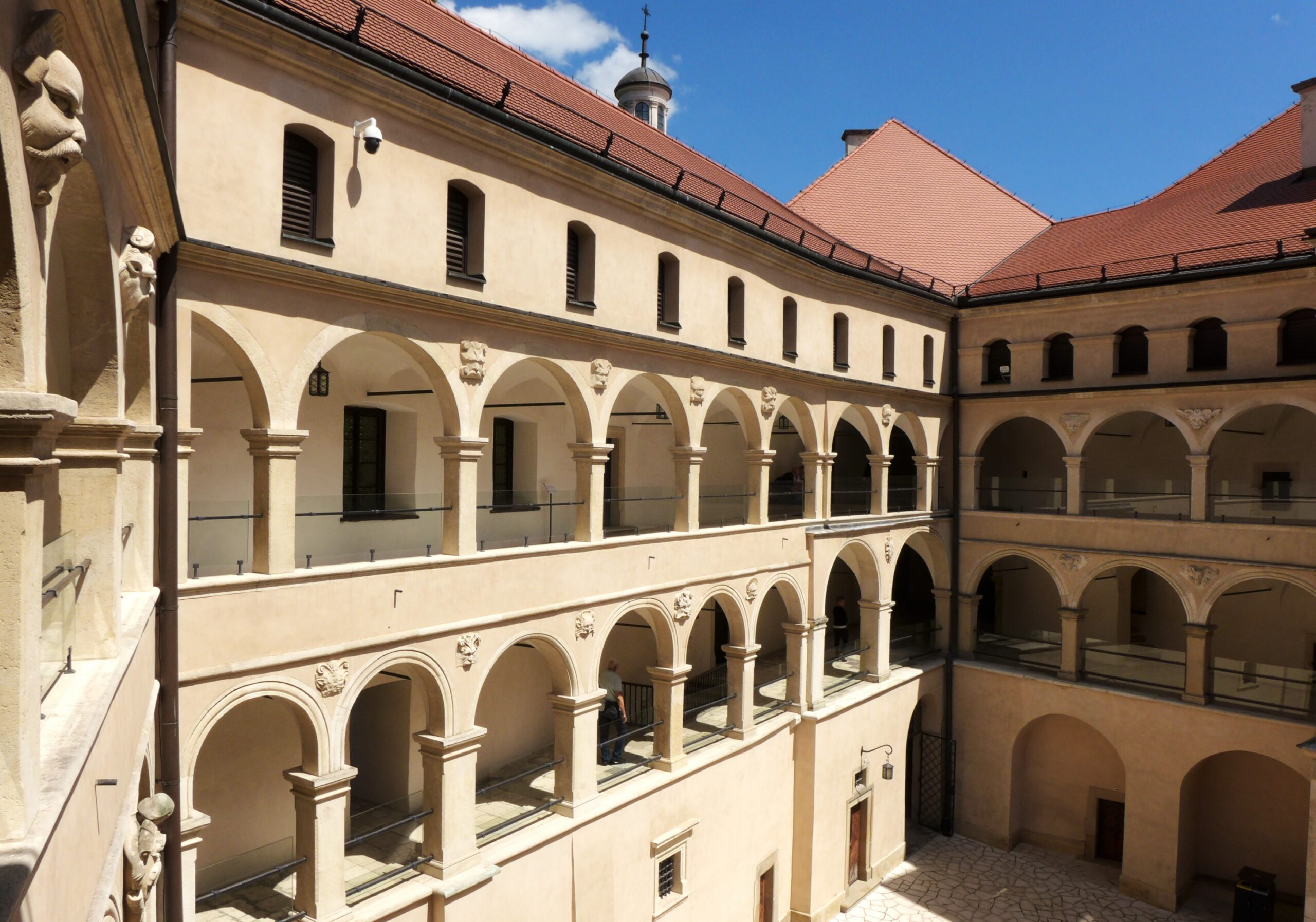 Arcaded stone courtyard of a castle in southern Poland