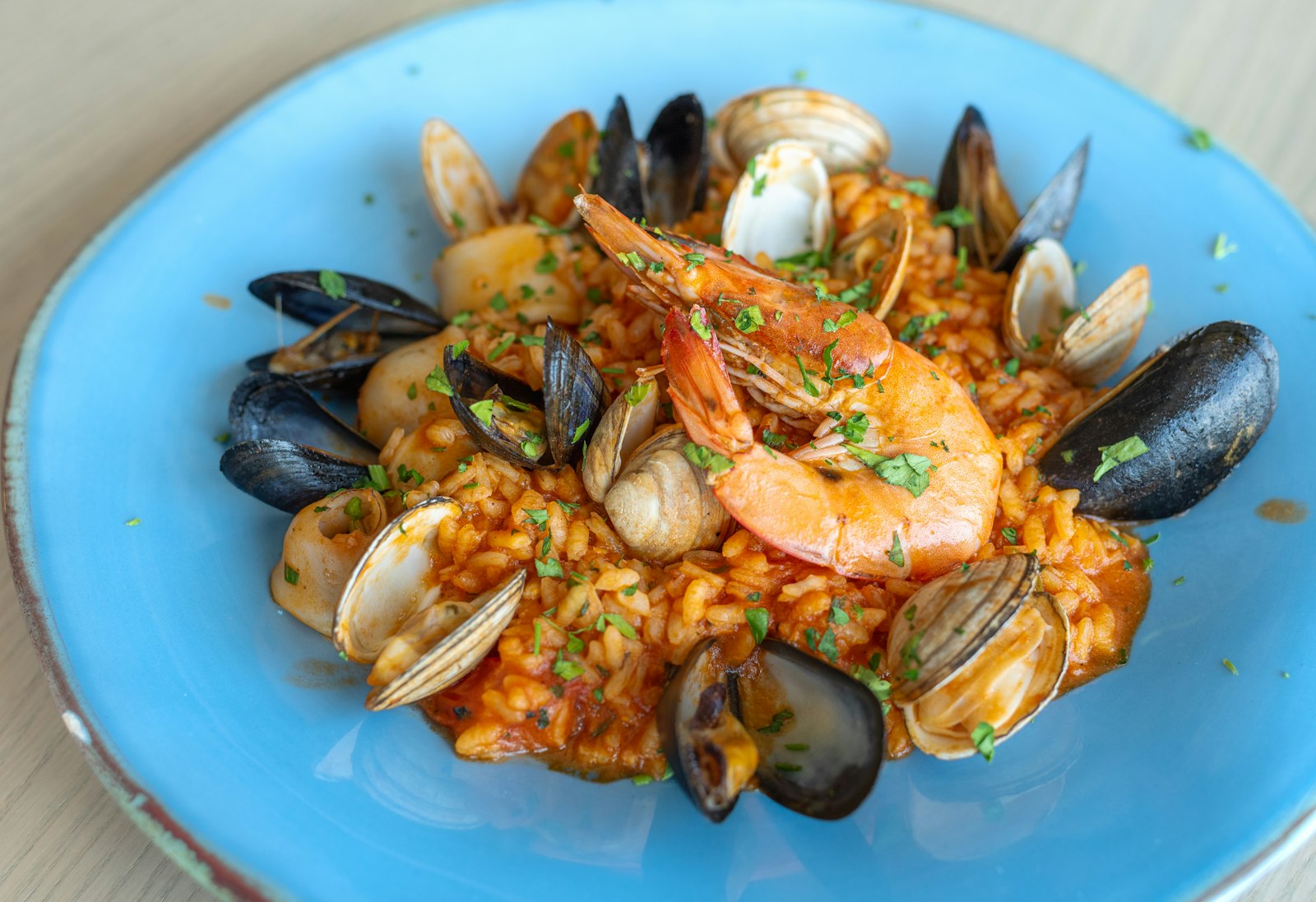 Seafood paella with mussels and shrimp