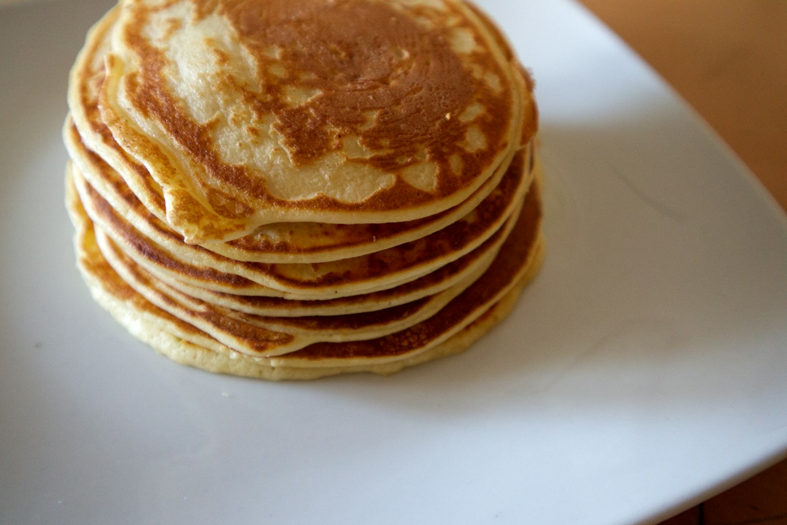 Stack of golden pumpkin pancakes