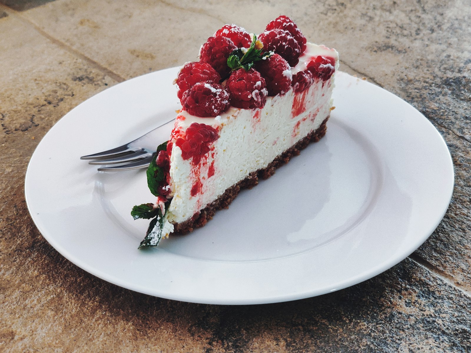 Raspberry swirl cheesecake slice
