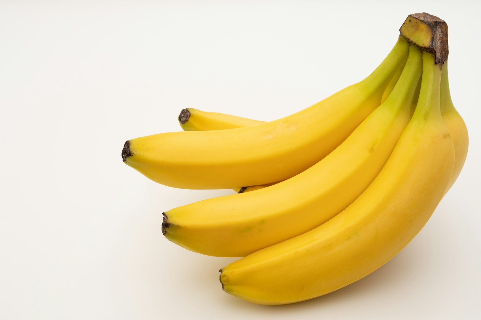 A bunch of ripe yellow bananas, one of the best pre workout snacks