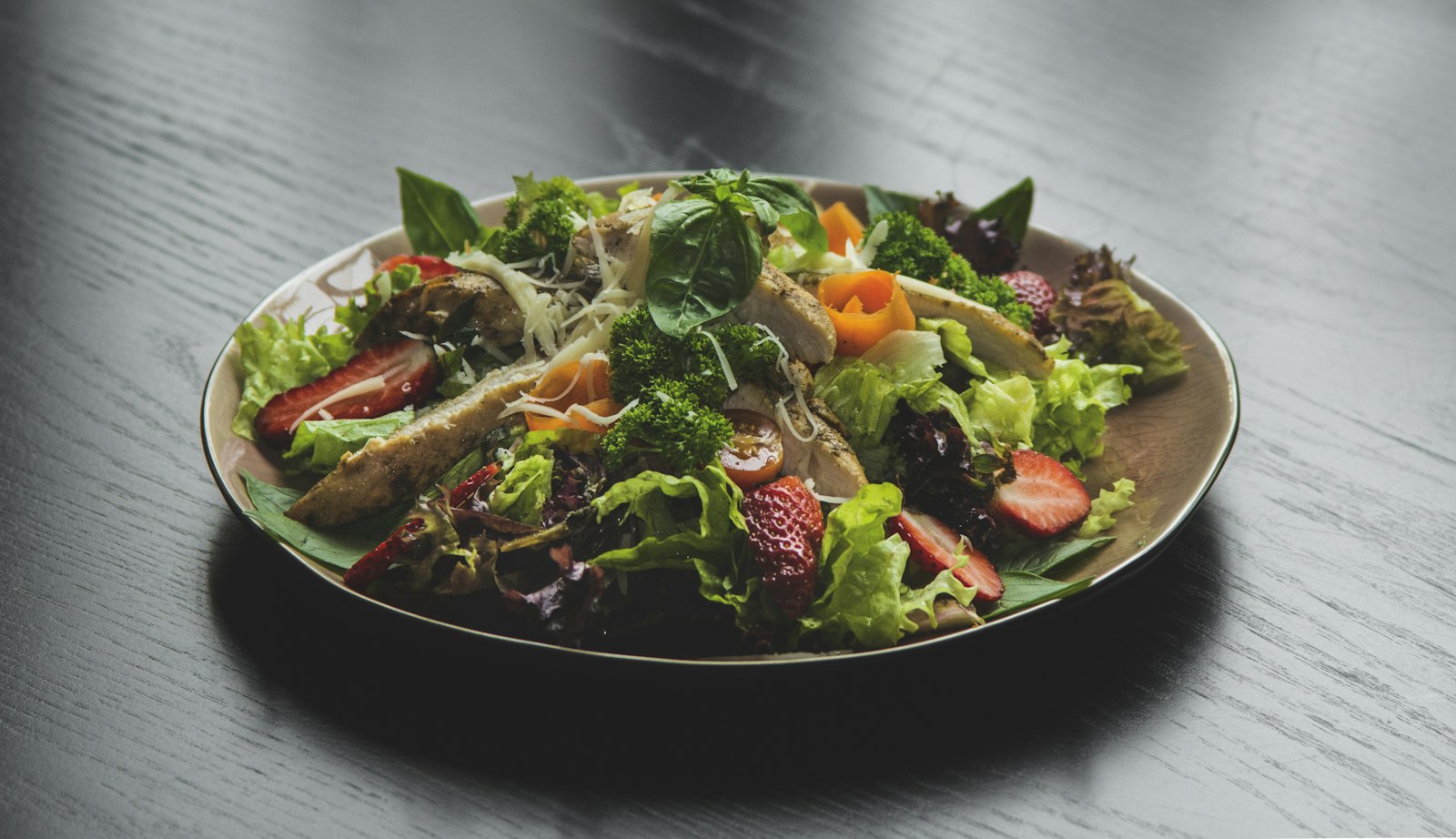 Thanksgiving leftover recipes: leafy salad with sliced meat and vegetables