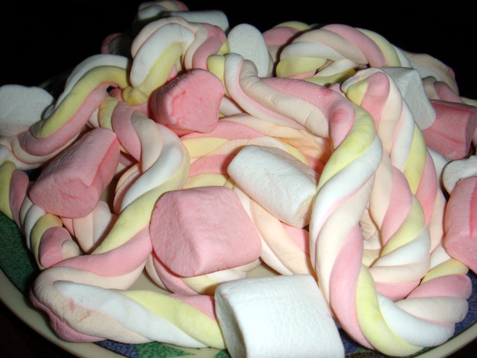 Pastel twisted candy ropes in pink, yellow and white