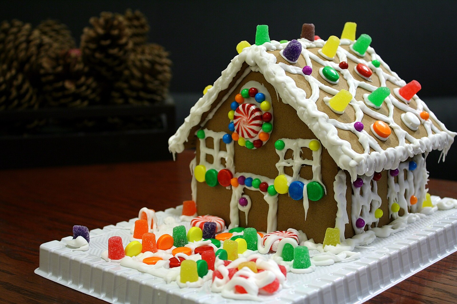 Gingerbread house covered in gumdrops and candies