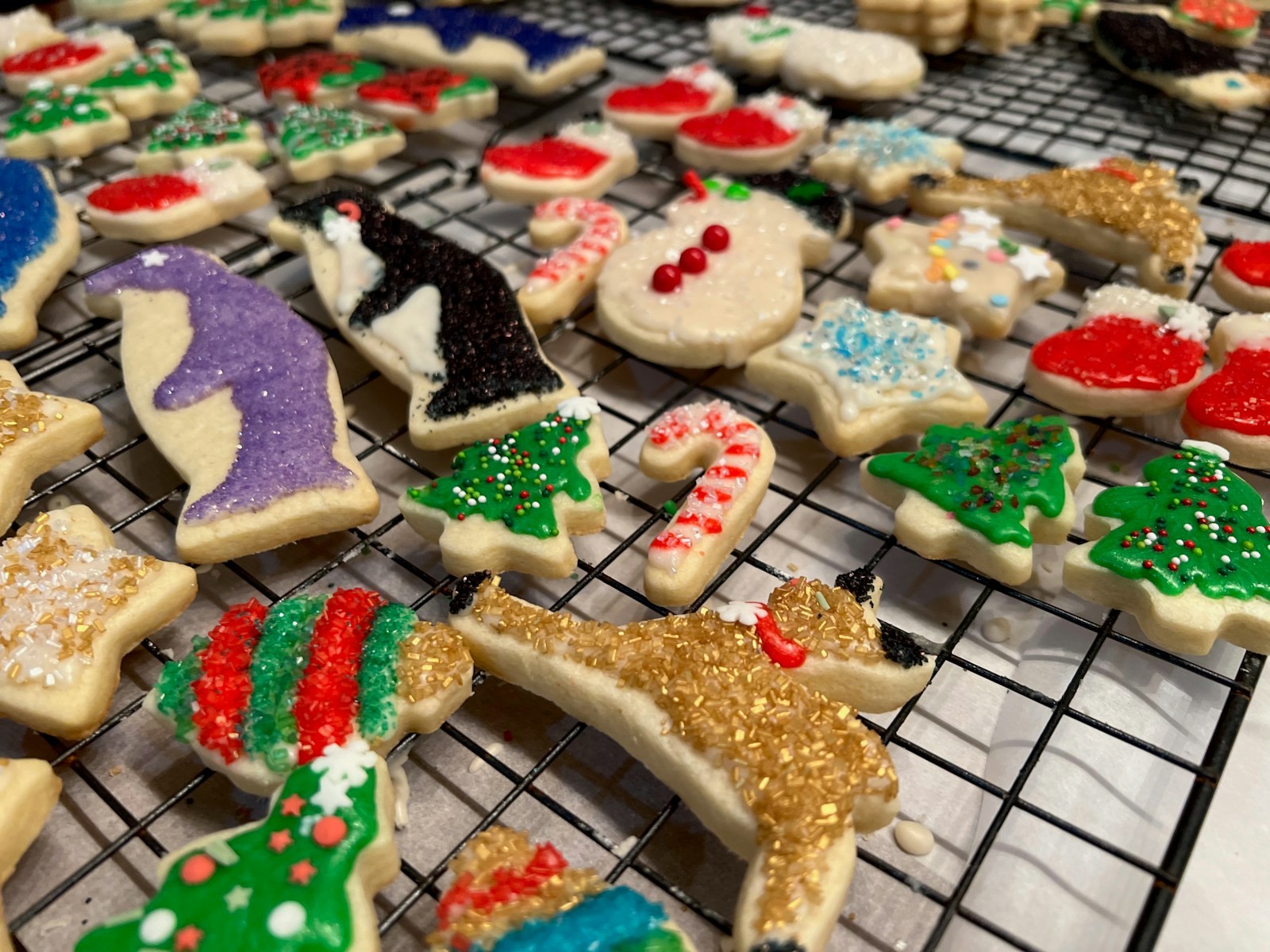 Sparkling showstopper Christmas cookies with sanding sugar on a cooling rack