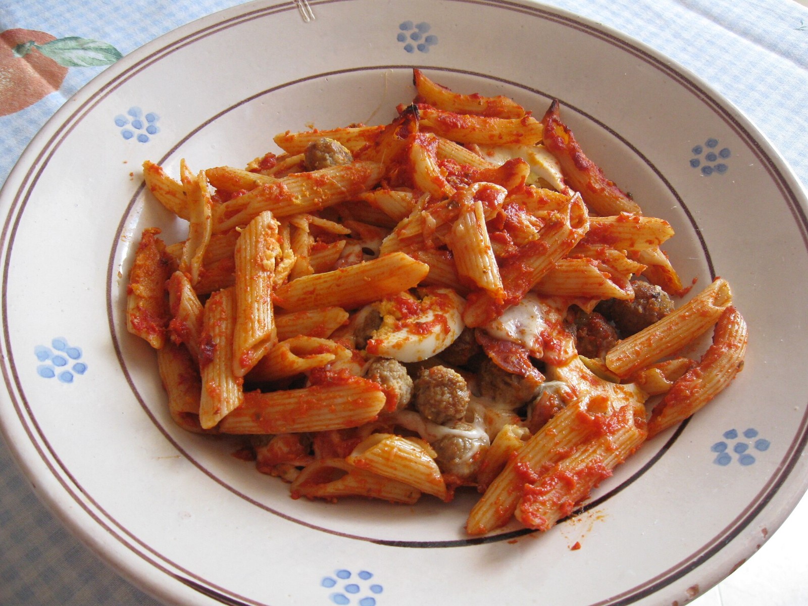 Baked ziti pasta with sausage and tomato sauce, one of the Valerie Bertinelli recipes style dinners