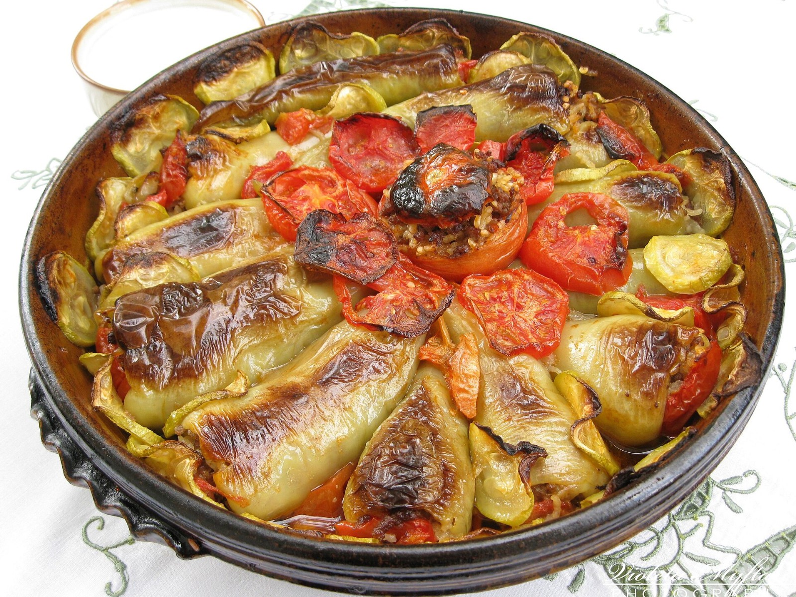 Baked stuffed peppers in a round dish for an unstuffed pepper casserole