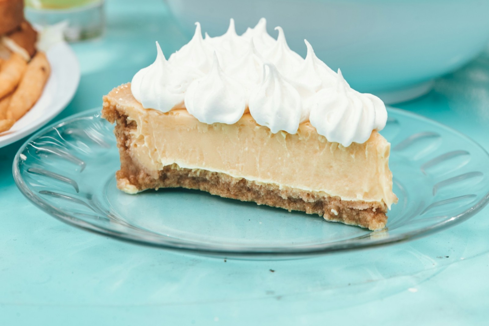 Slice of lemon icebox pie with whipped topping