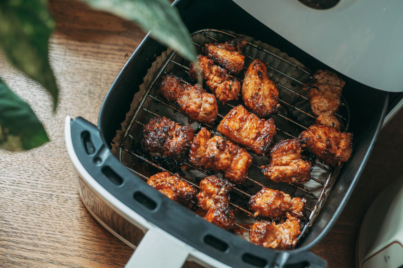 Air fryer hacks: chicken pieces spread out in a single layer in the basket
