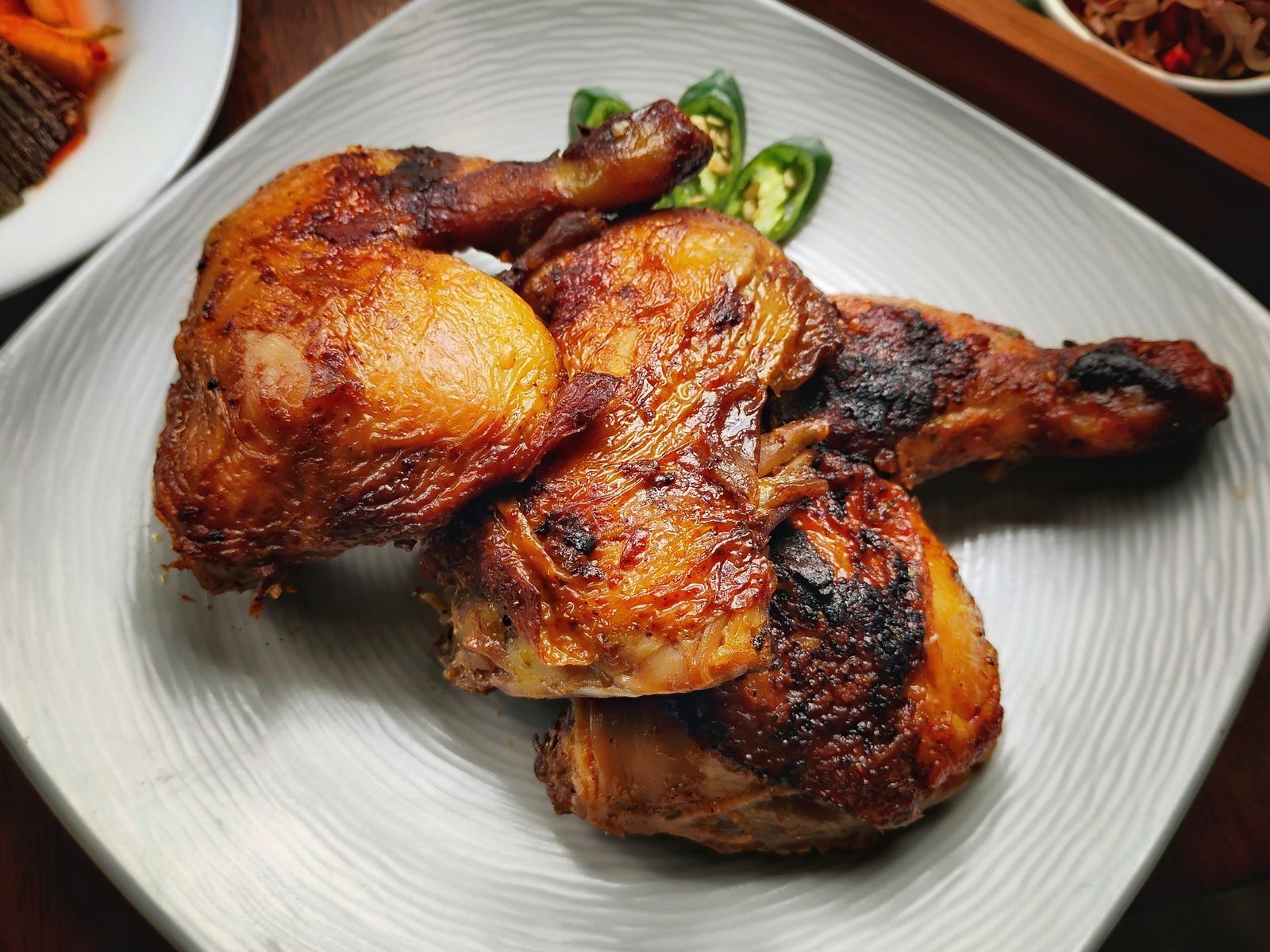 Air fryer hacks: crispy skin roasted chicken pieces on a plate