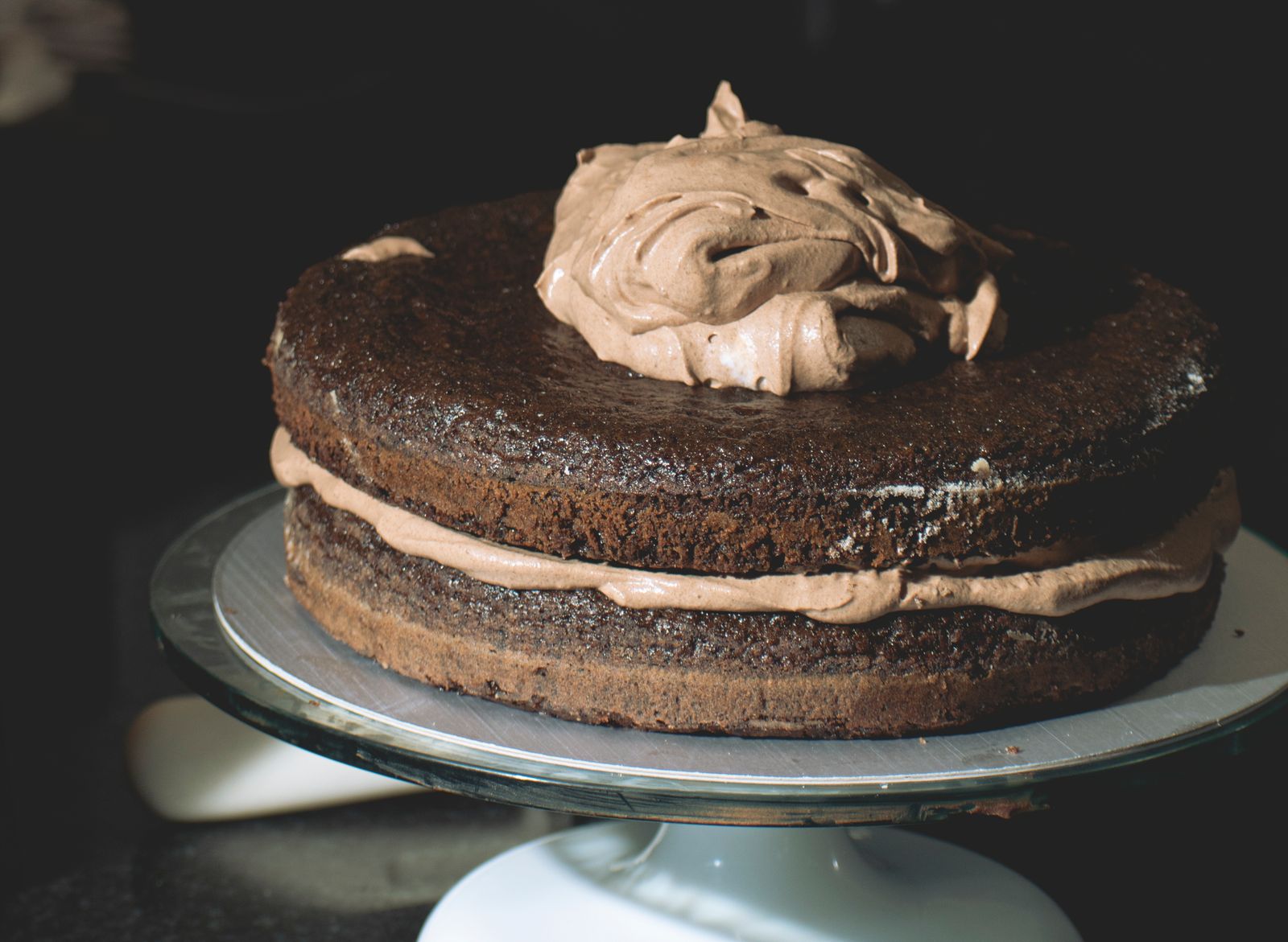 Chocolate layer cake with a rich fudge topping