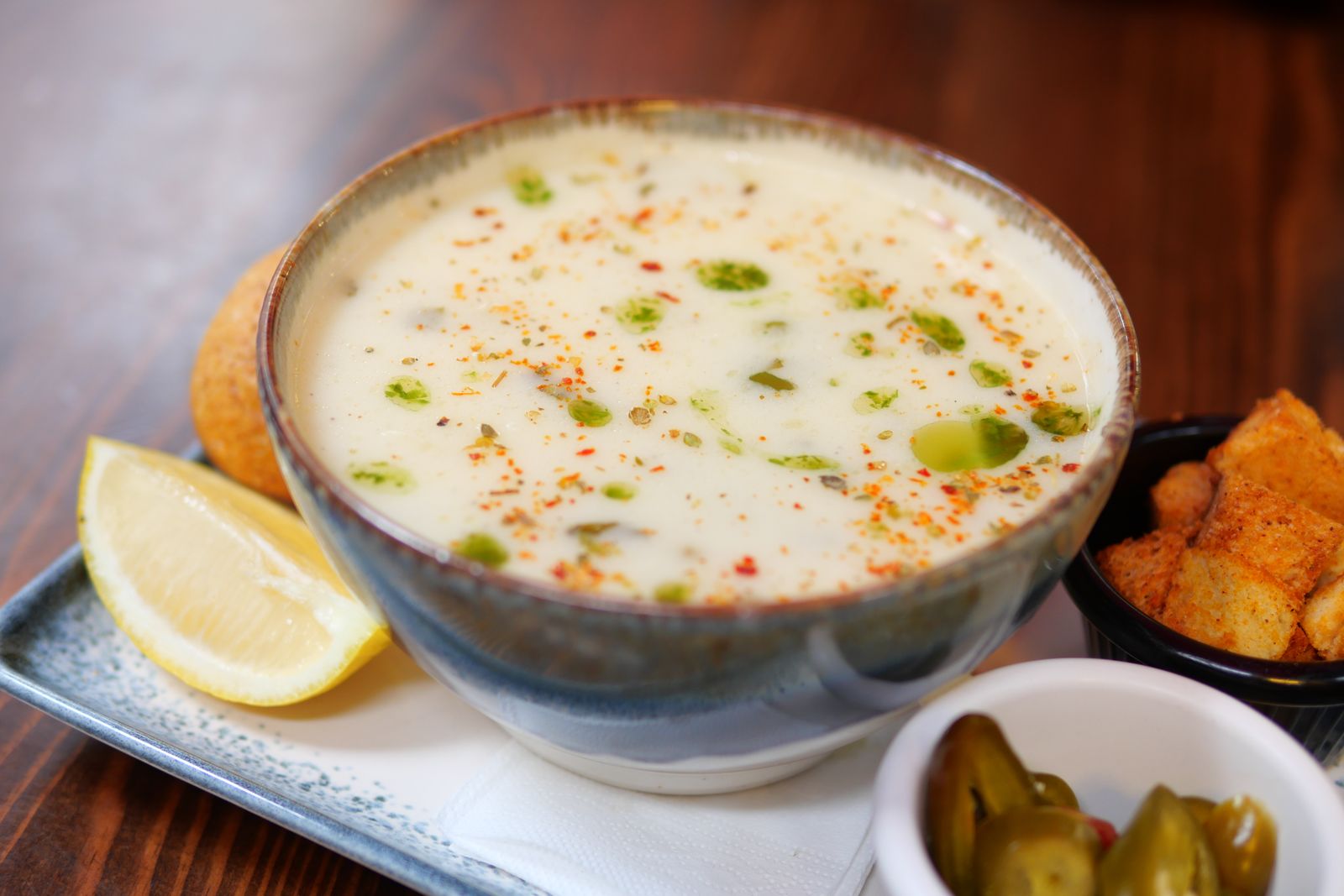 White fish recipes: creamy fish chowder in a bowl with lemon