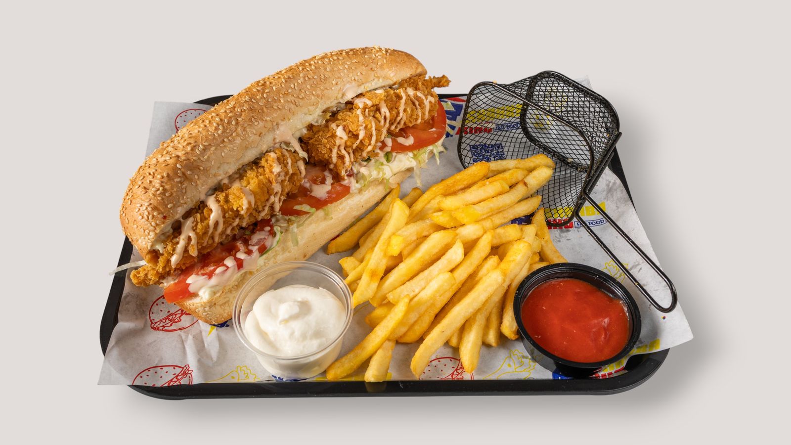 Crispy breaded sandwich with fries