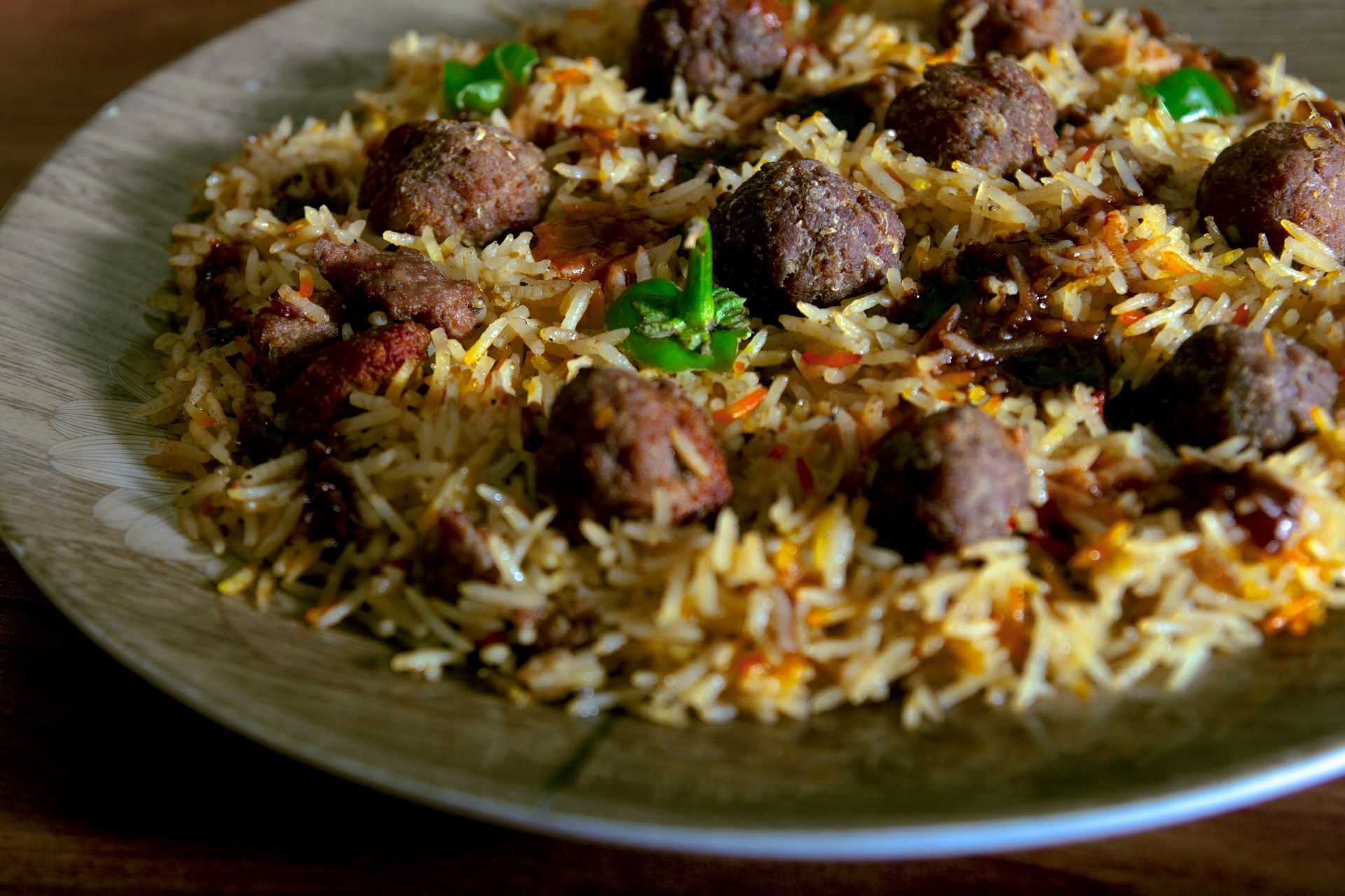 Meatballs nestled in a fragrant pilaf with herbs