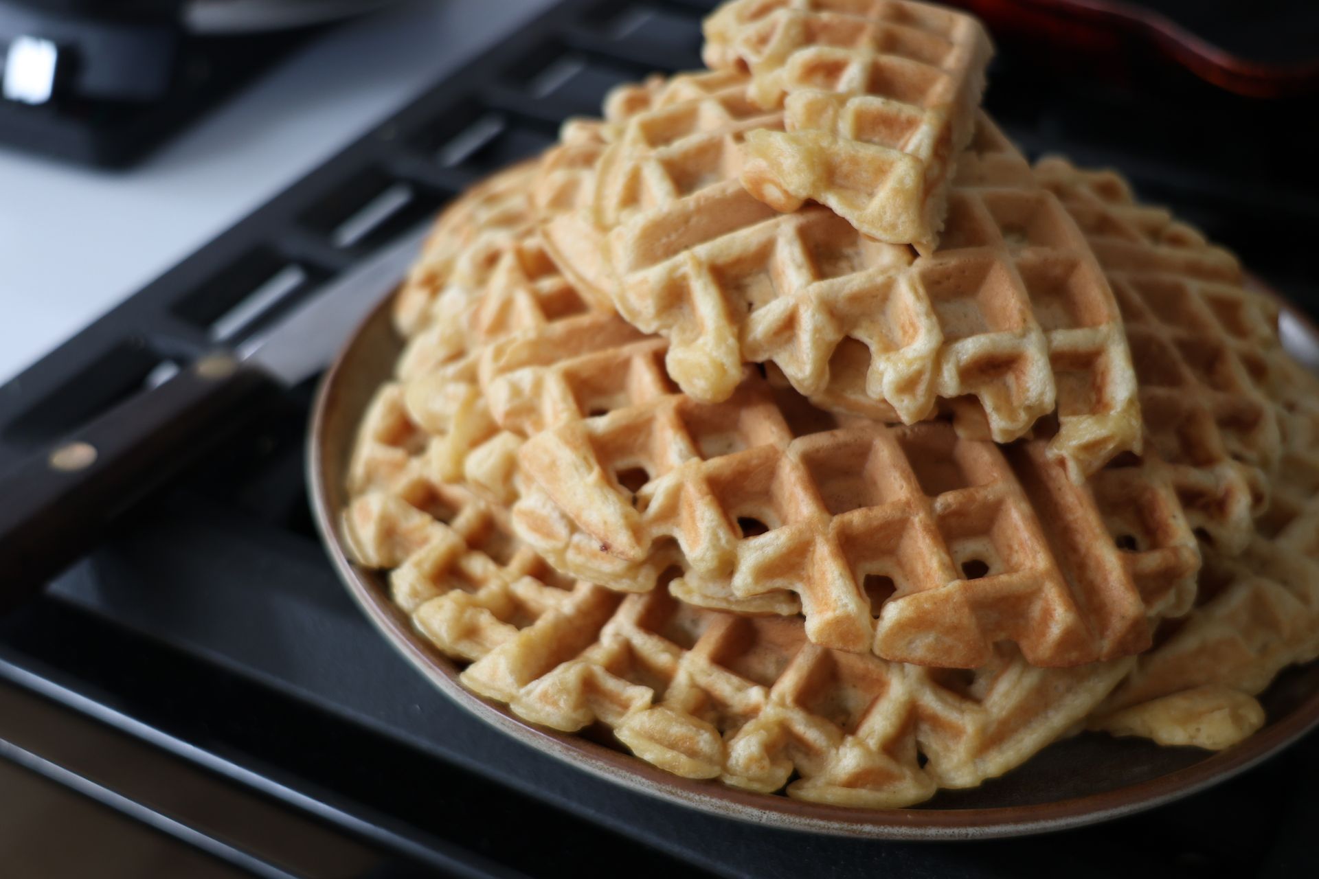 Leftover mashed potatoes: golden waffles stacked on a plate