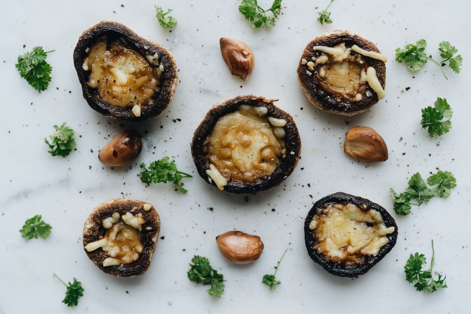 Cheese stuffed mushrooms garnished with parsley