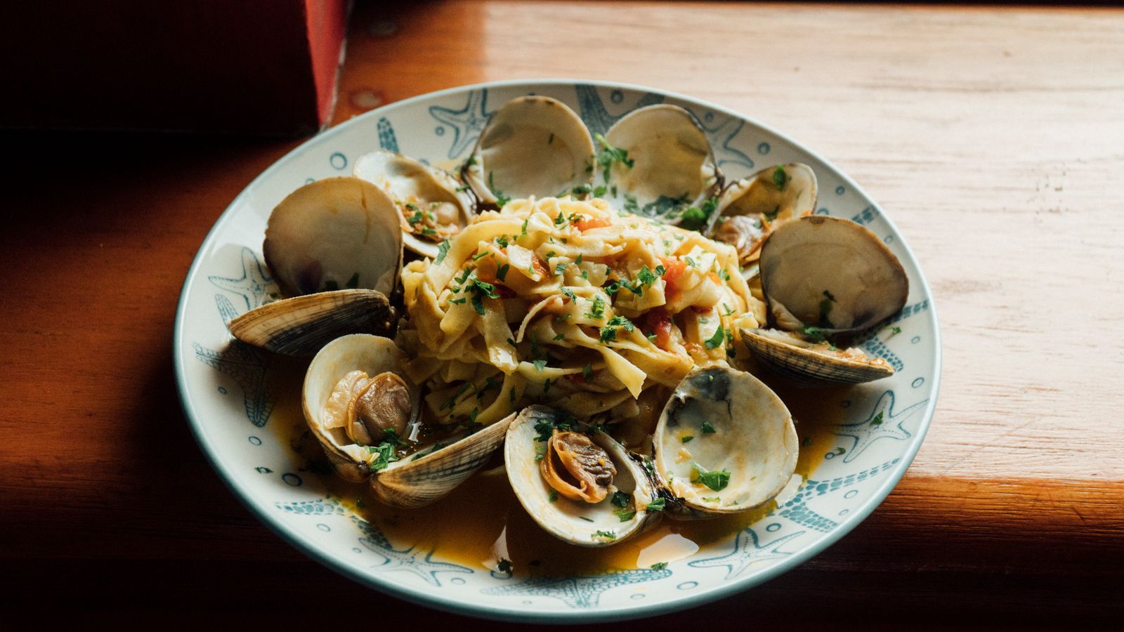 Feast of the Seven Fishes linguine with clams on a plate