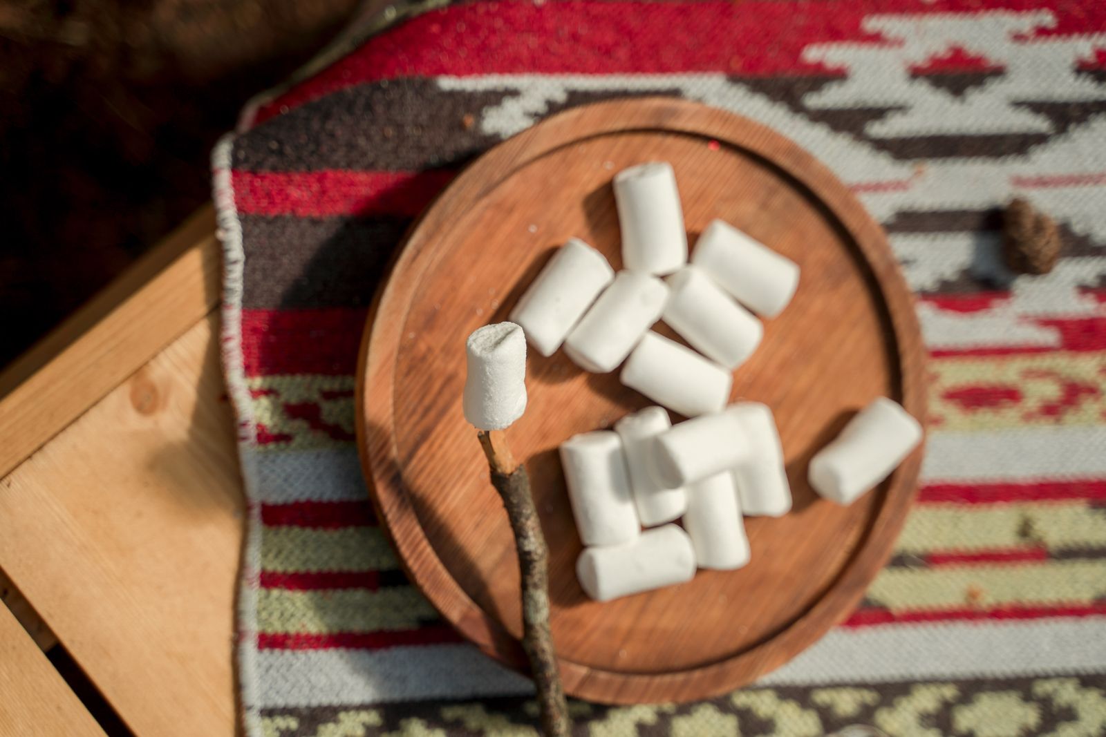 Homemade marshmallow squares on a wooden board
