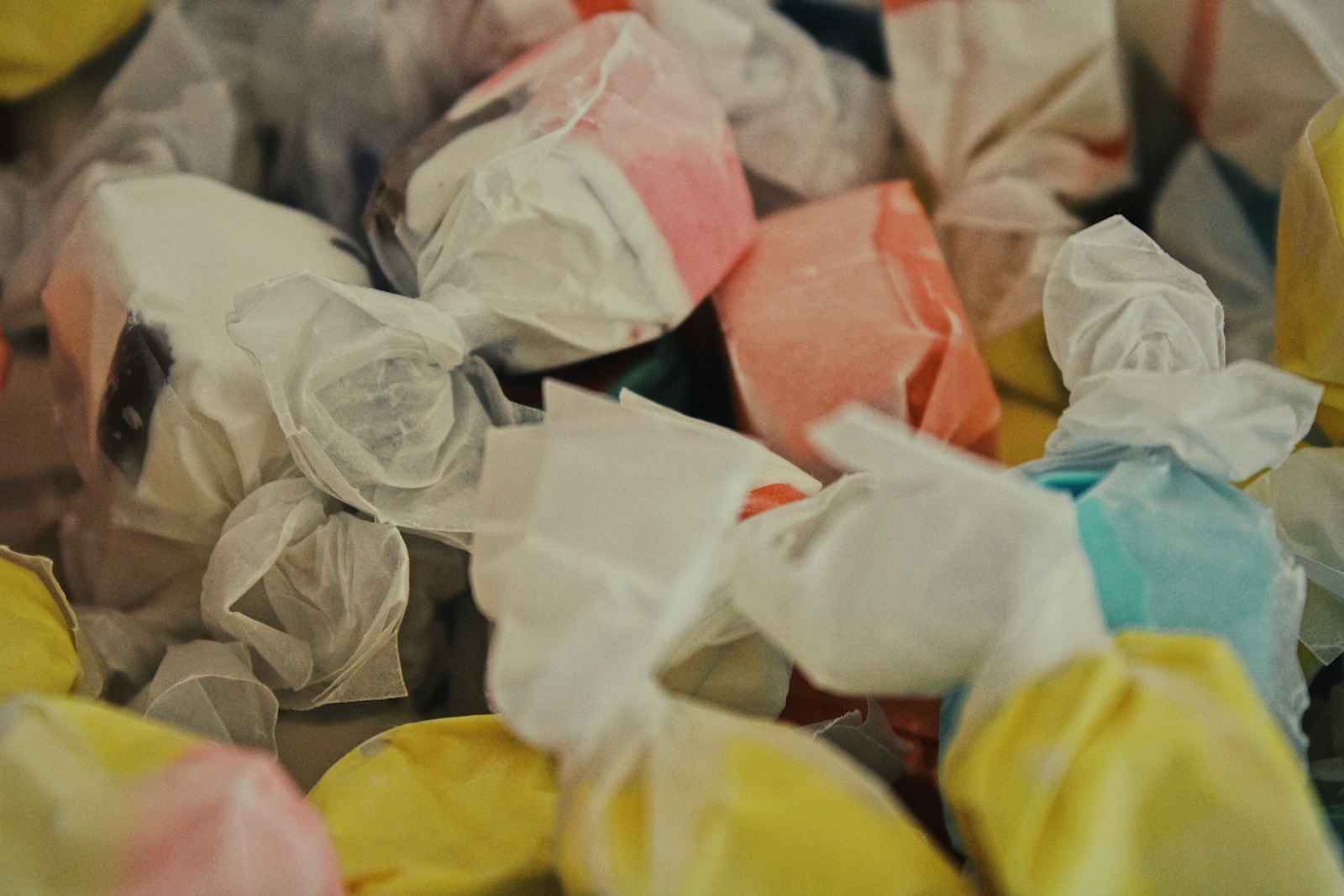 Pastel wrapped taffy pieces in wax paper, homemade Halloween candy