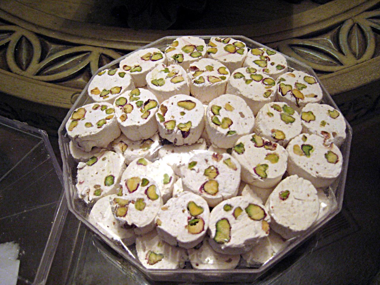 White nougat pieces studded with pistachios, homemade Halloween candy