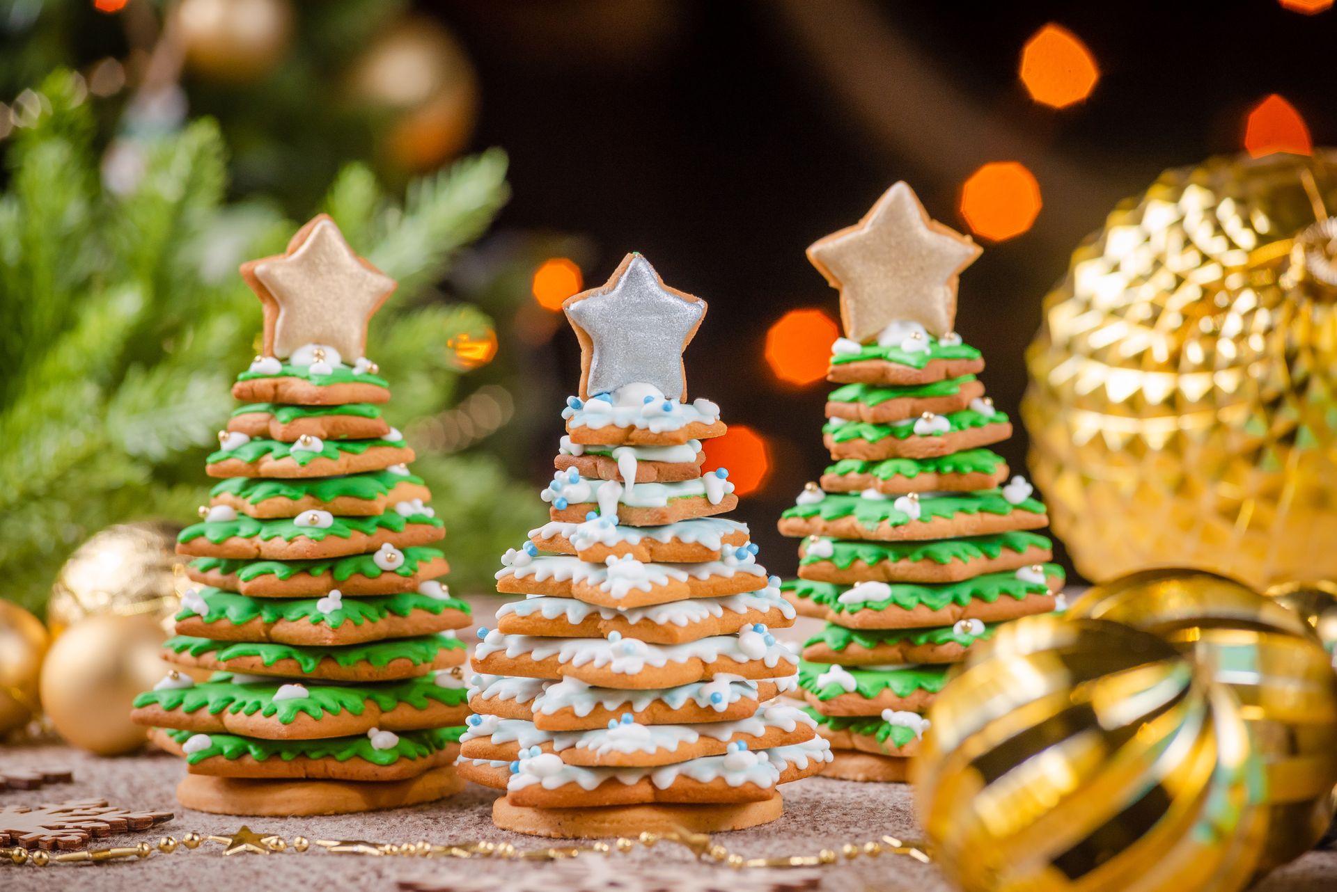 Christmas tree desserts: stacked star sugar cookie trees with green icing and star toppers