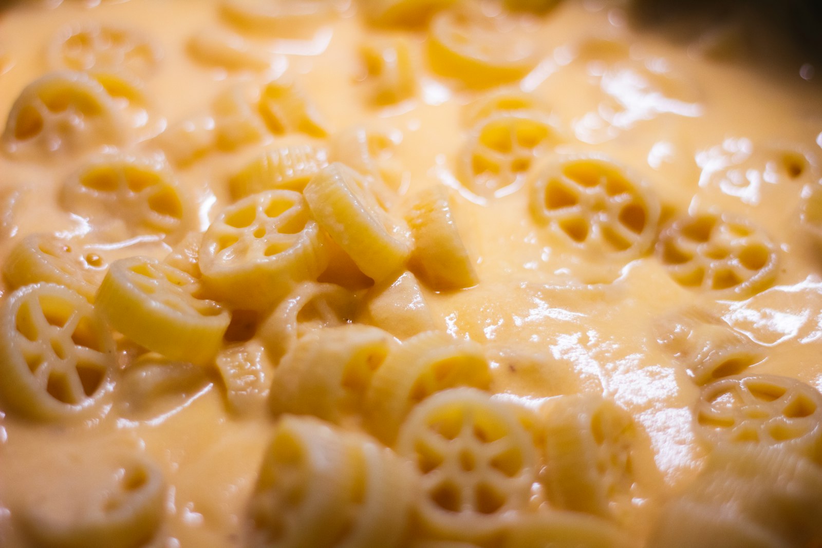 Slow cooker full of creamy cheddar pasta for a crowd