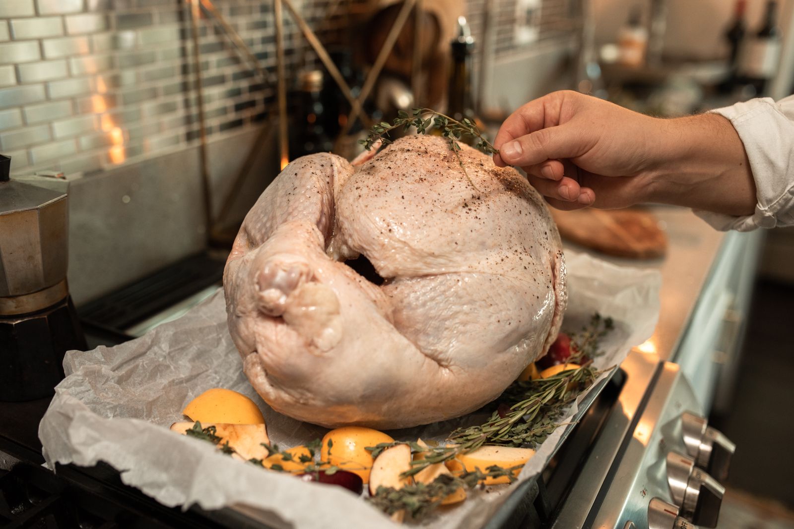 Raw turkey seasoned with salt and herbs on a rack, Thanksgiving turkey