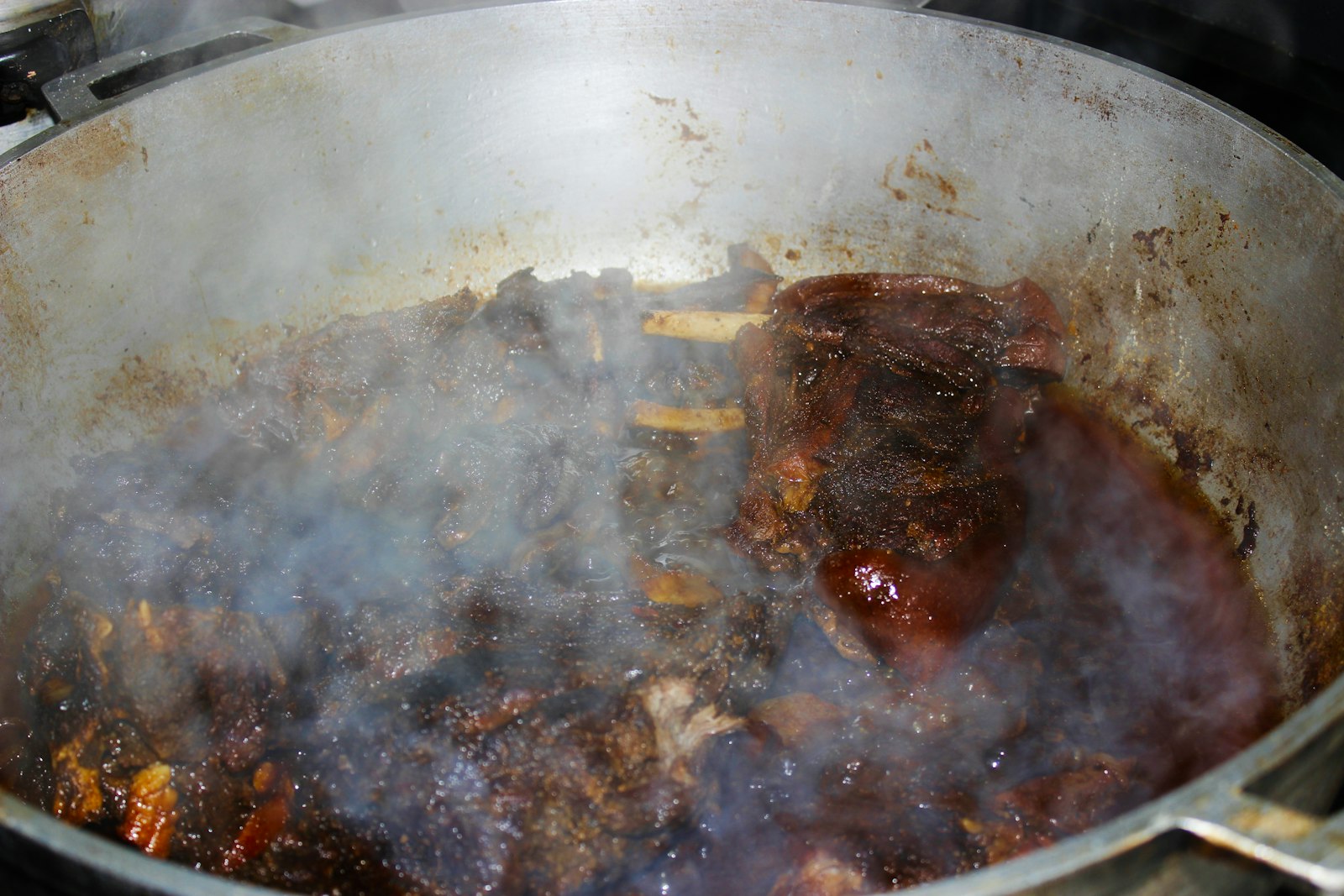 Turkey stock and gravy simmering in a pot, Thanksgiving turkey