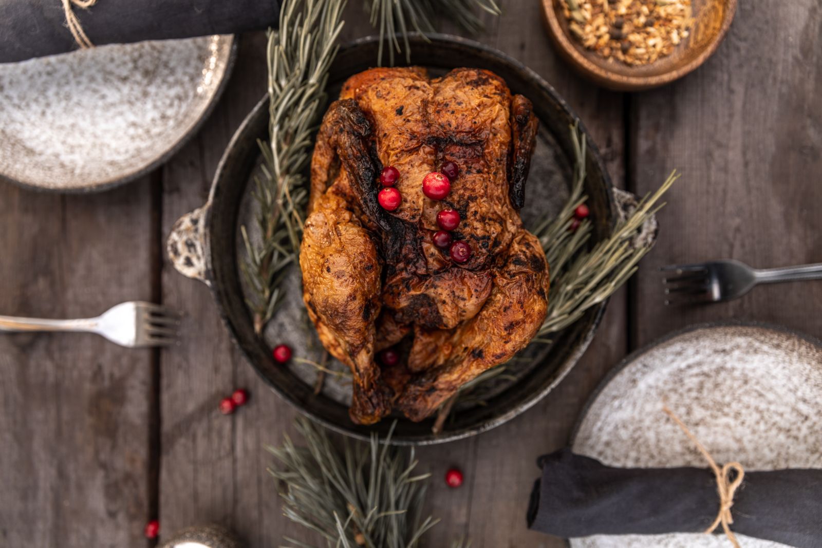 Roast turkey with lemon and herbs in a pan, Thanksgiving turkey