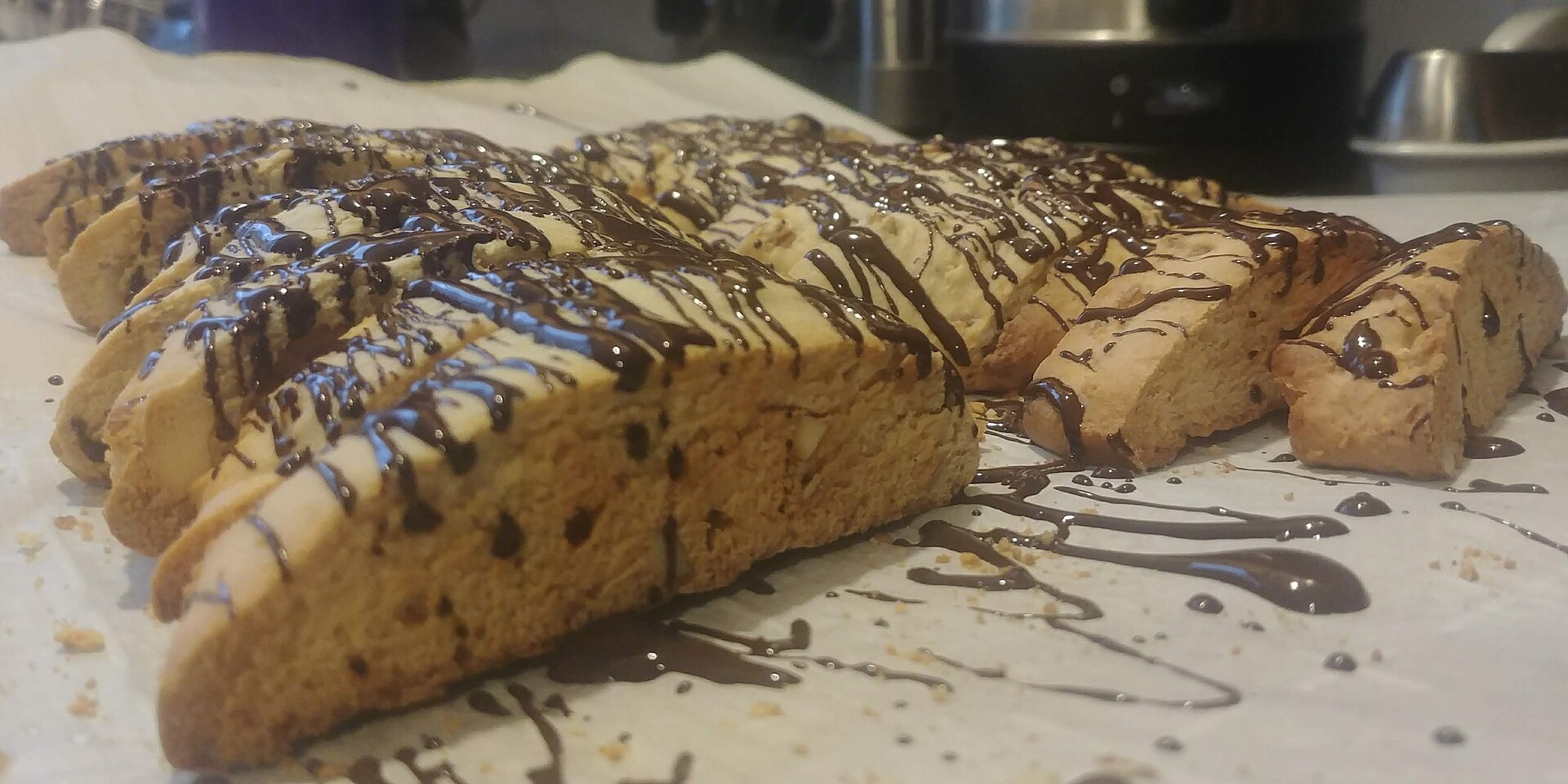 Almond cookies drizzled with dark chocolate