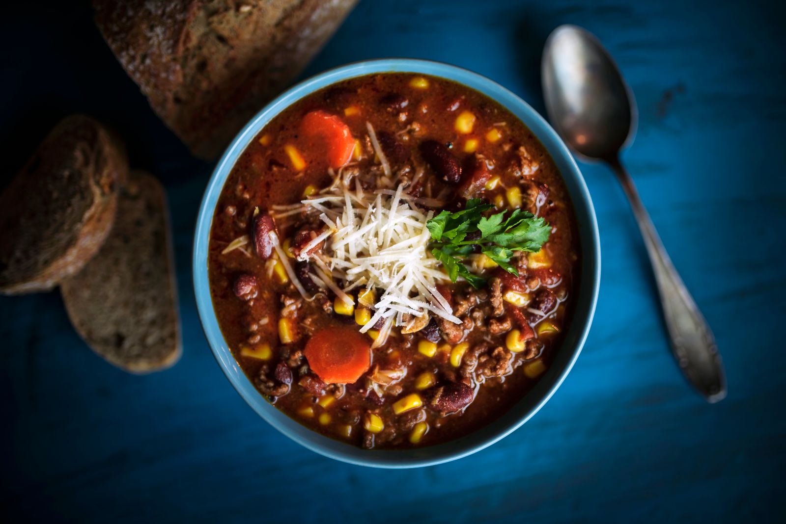 Bowl of cowboy chili with bread