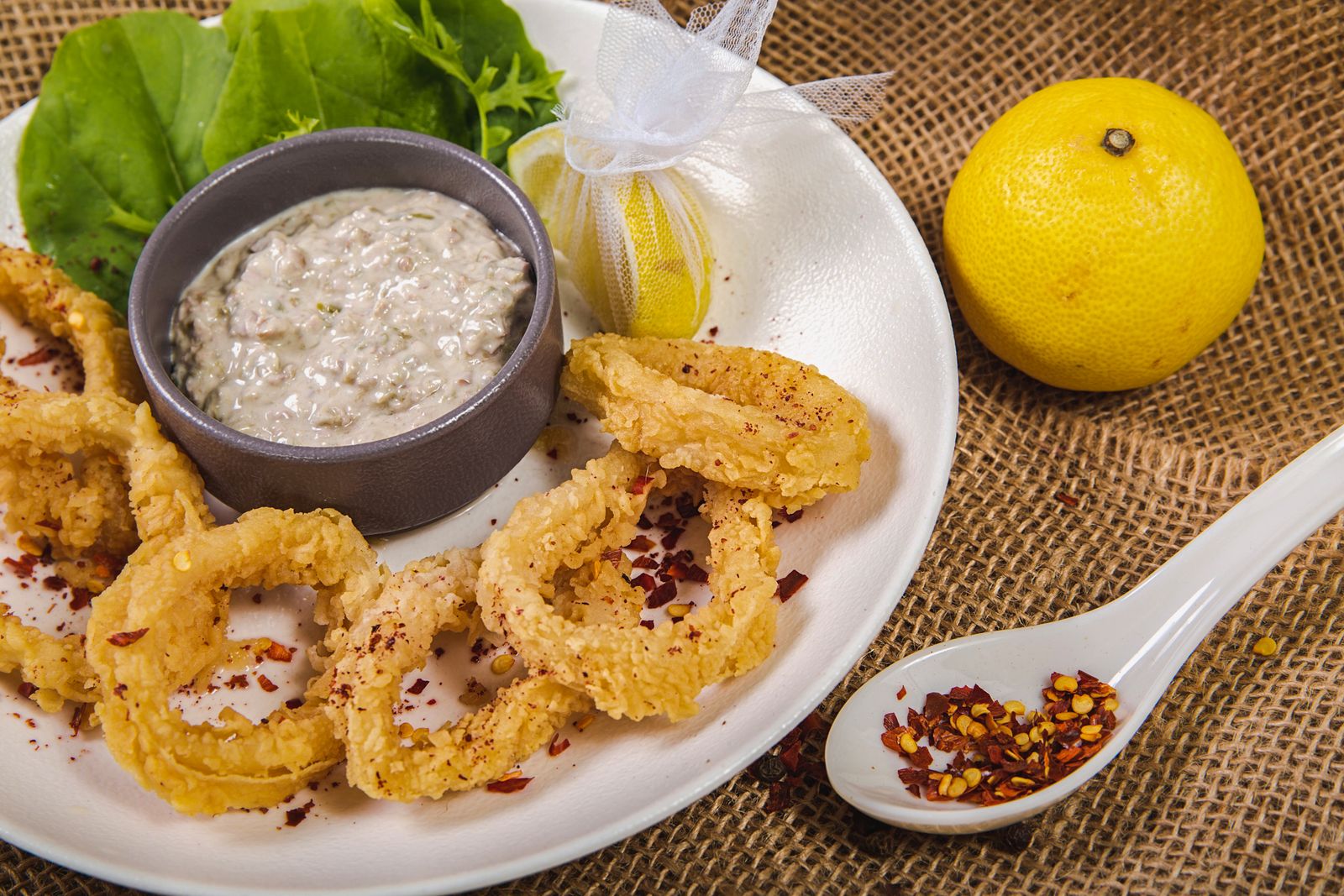 Homemade tartar sauce with fried calamari