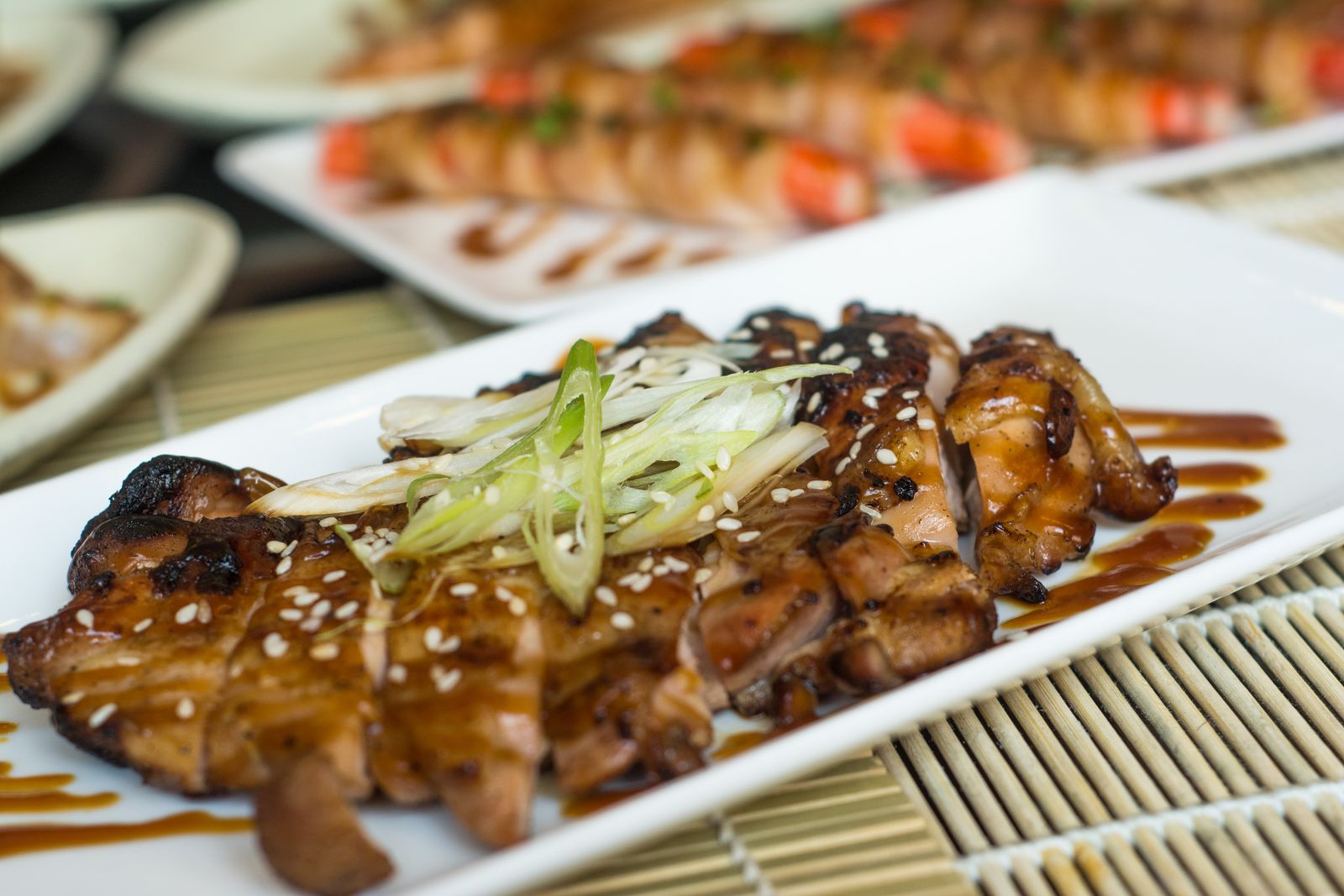 Glossy teriyaki glazed chicken skewers