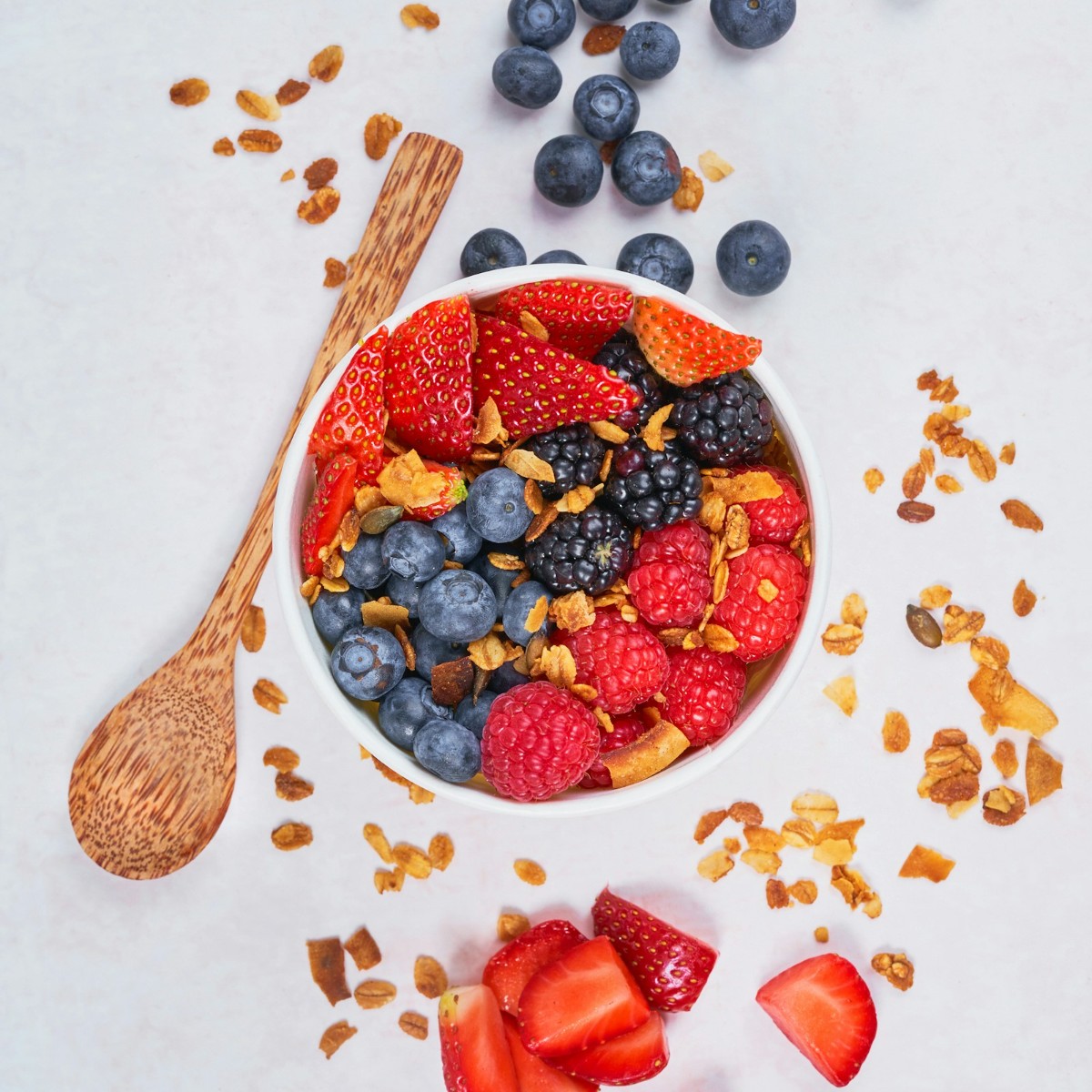 Bowl of fresh strawberries and blueberries