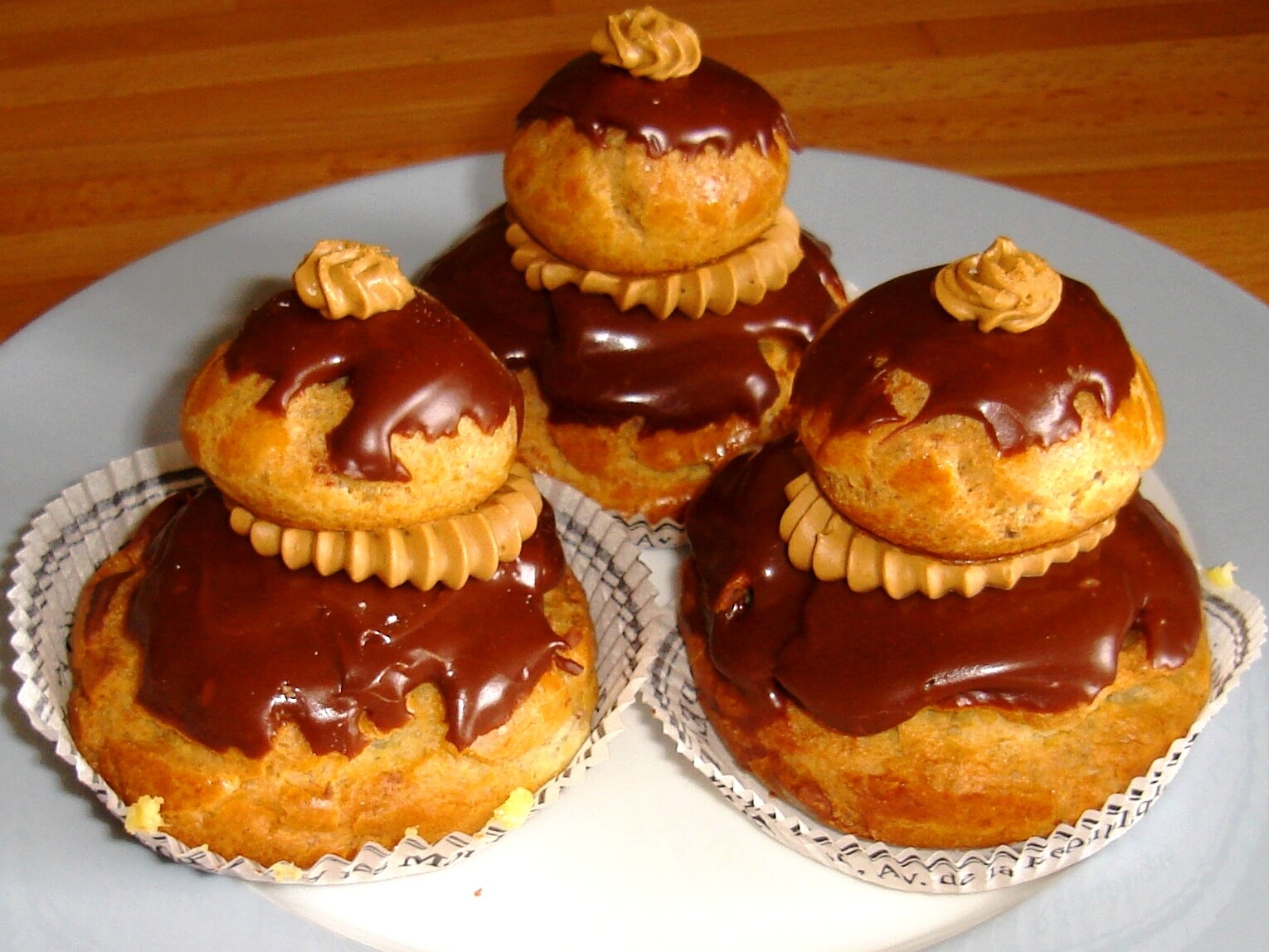 Cream puffs stacked as chocolate religieuses