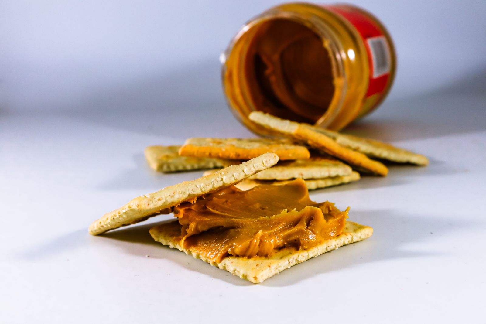 Fudge covered crackers start here: peanut butter spread on crackers