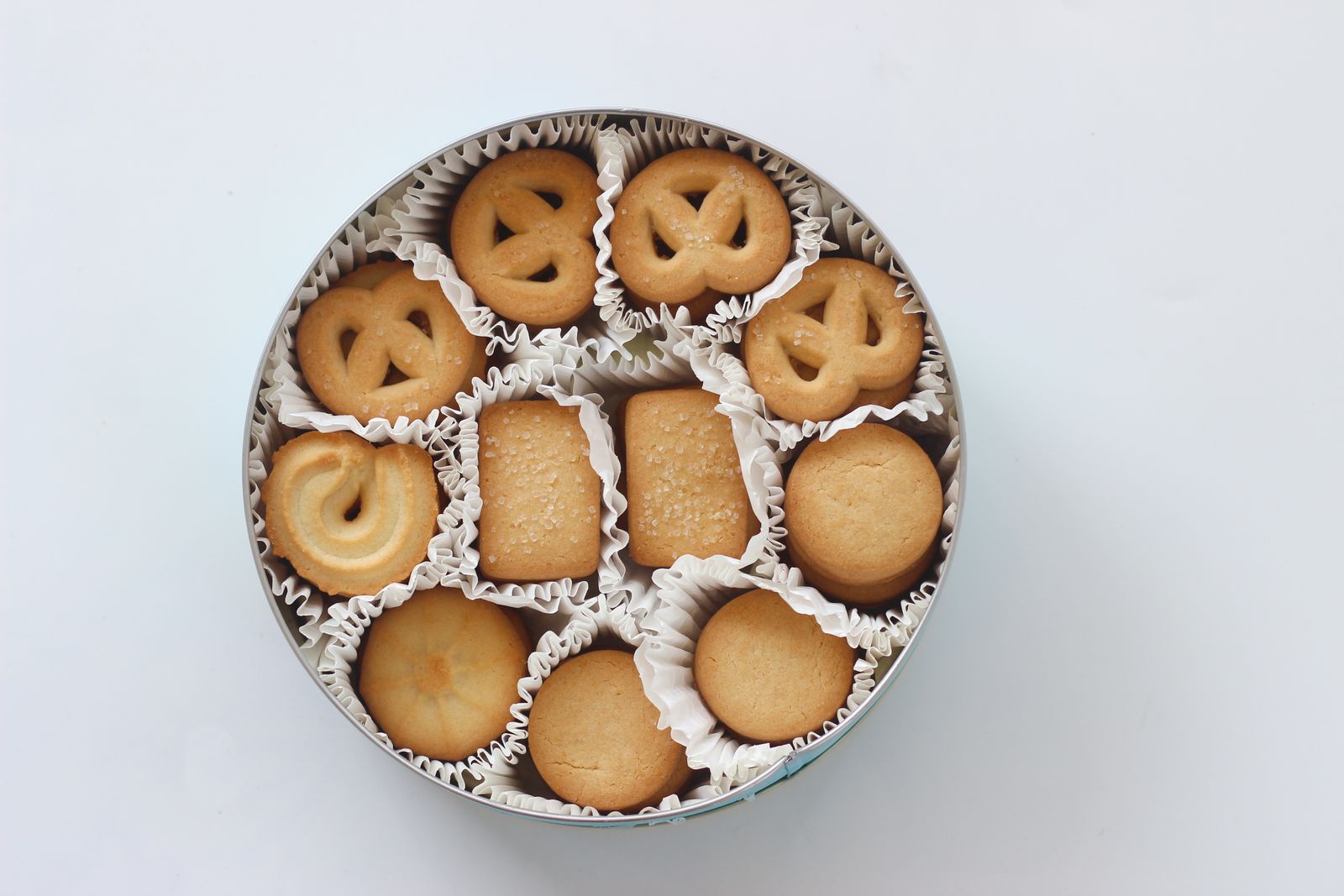 Homemade treats packed in a round gift tin