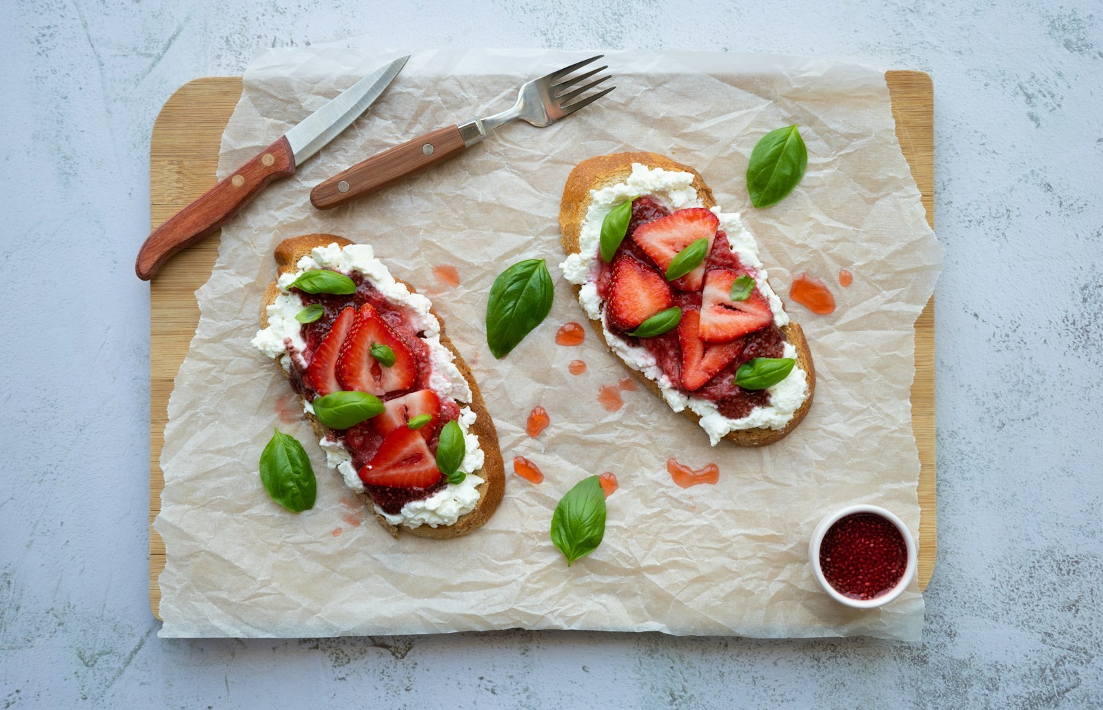 Sweet strawberry crostini with ricotta and basil