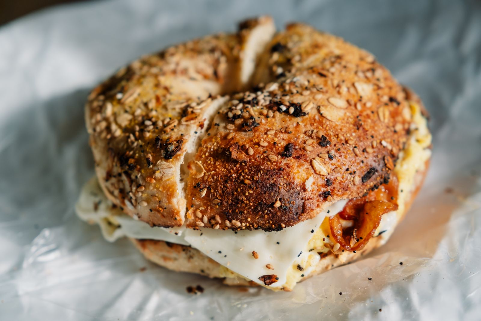An everything seasoned roll stuffed with cream cheese