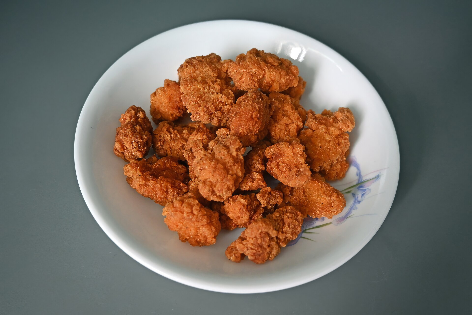 A plate of small crispy fried bites
