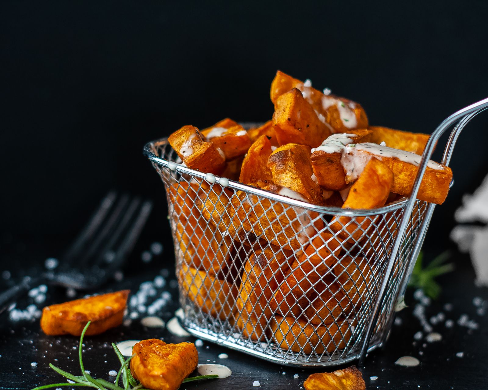 Crispy sweet potato fries in a basket