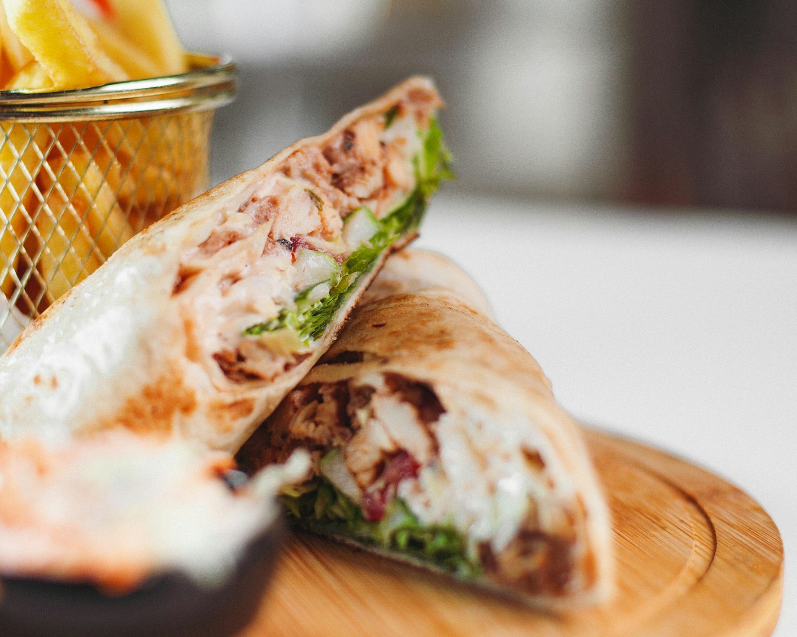 Turkey and veggie wrap cut in half