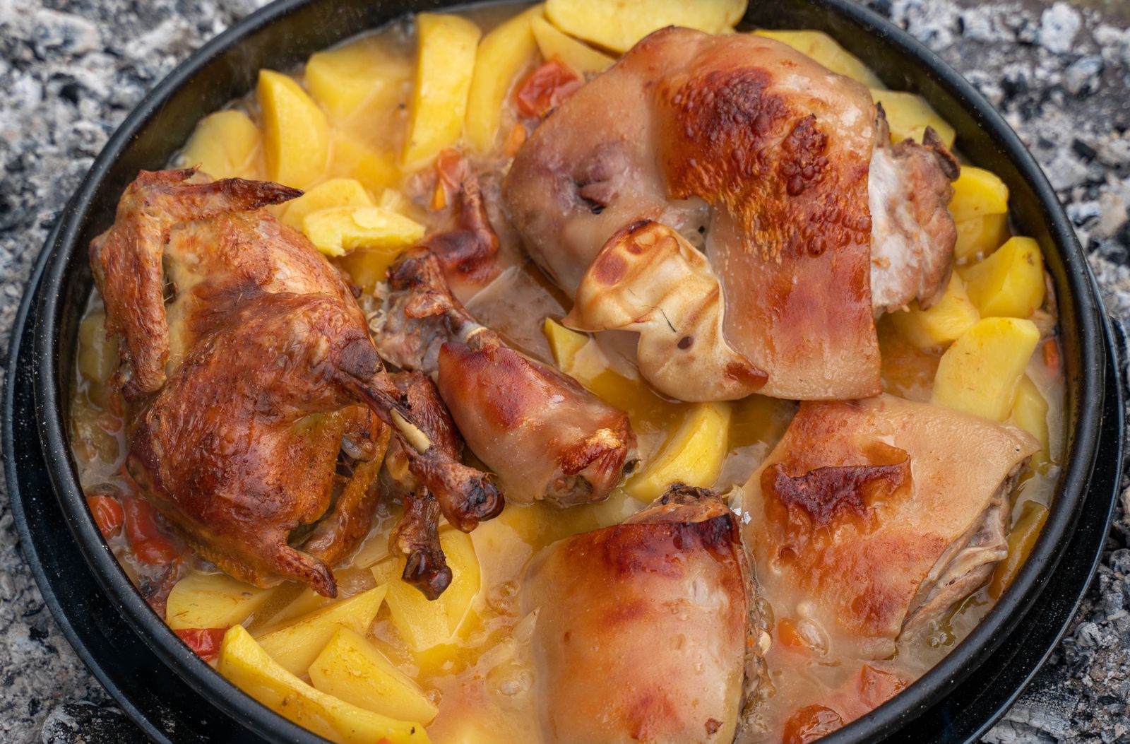 Three-ingredient dump dinners: roasted chicken thighs and potatoes in a pan